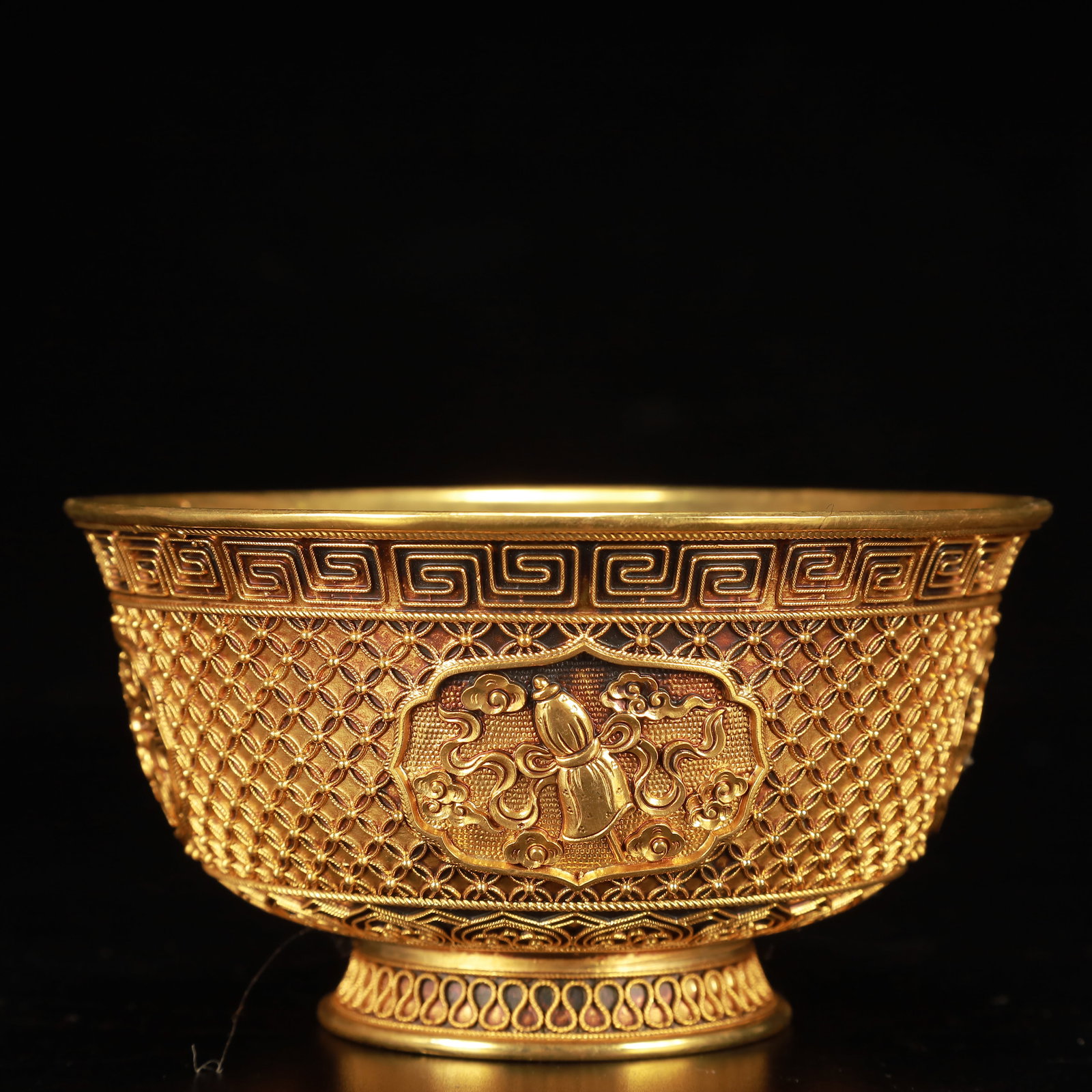 An Exquisite Gilt Bronze Eight Treasures Pattern Bowl: An Exquisite Gilt Bronze Eight Treasures Pattern Bowl,Qing Dynasty, China,Qianlong Four-character Mark,Size:4.9inx2.8in,Weight:350g 铜鎏金八宝纹碗,中