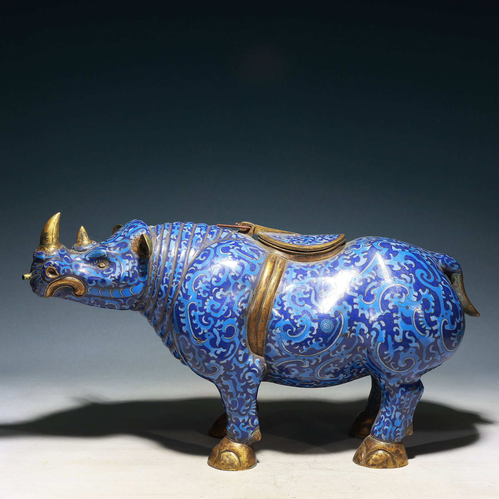 A Huge Cloisonne Bats Pattern Rhinoceros Ornament: A Huge Cloisonne Bats Pattern Rhinoceros Ornament,Qing Dynasty, China,Size:23.2inx7.5inx13in,Weight:4950g