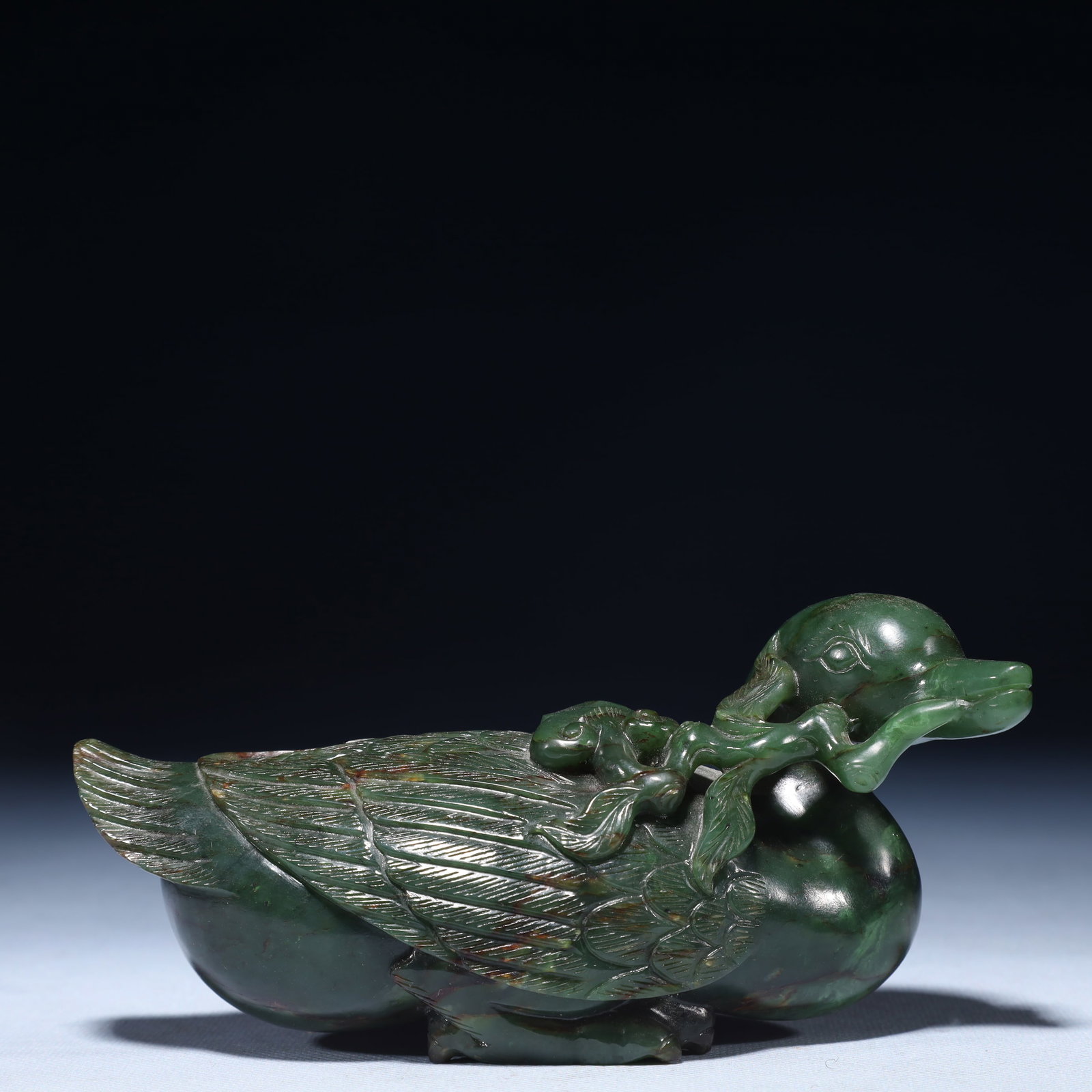 An Exquisite Jasper Duck Shaped Ornament: An Exquisite Jasper Duck Shaped Ornament, Qing Dynasty,China, Size:6.3inx2.4inx3.1in,Weight:800g 碧玉鸭形摆件,中国清代