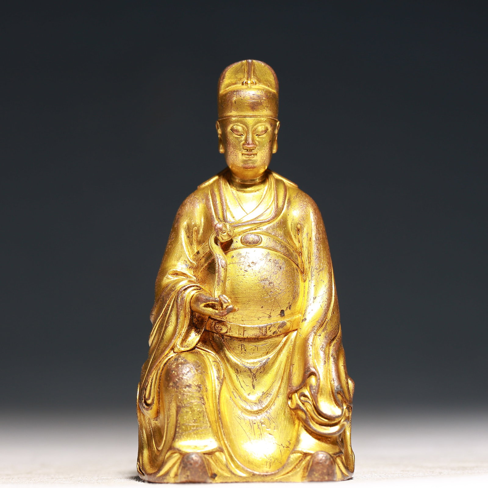 A Solemn Gilt Bronze Figure Ornament: A Solemn Gilt Bronze Figure Ornament,Qing Dynasty,China,Size:2inx3.9in,Weight:250g 铜鎏金人物摆件,中国清代