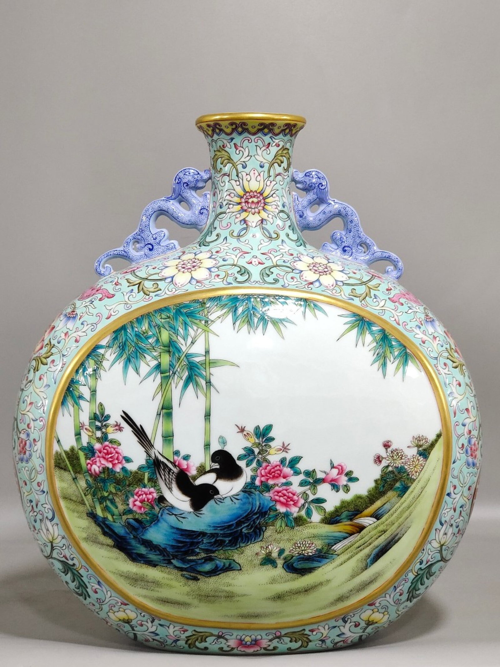 A Rare Turquoise Ground Famille-Rose Painted Gold Flower and Bird Pattern Dragon-Ears Vase: A Rare Turquoise Ground Famille-Rose Painted Gold Flower and Bird Pattern Dragon-Ears Vase,Qing Dynasty,China,Qianlong Six-character Mark,Size:11.8inx10.2in 松石绿地粉