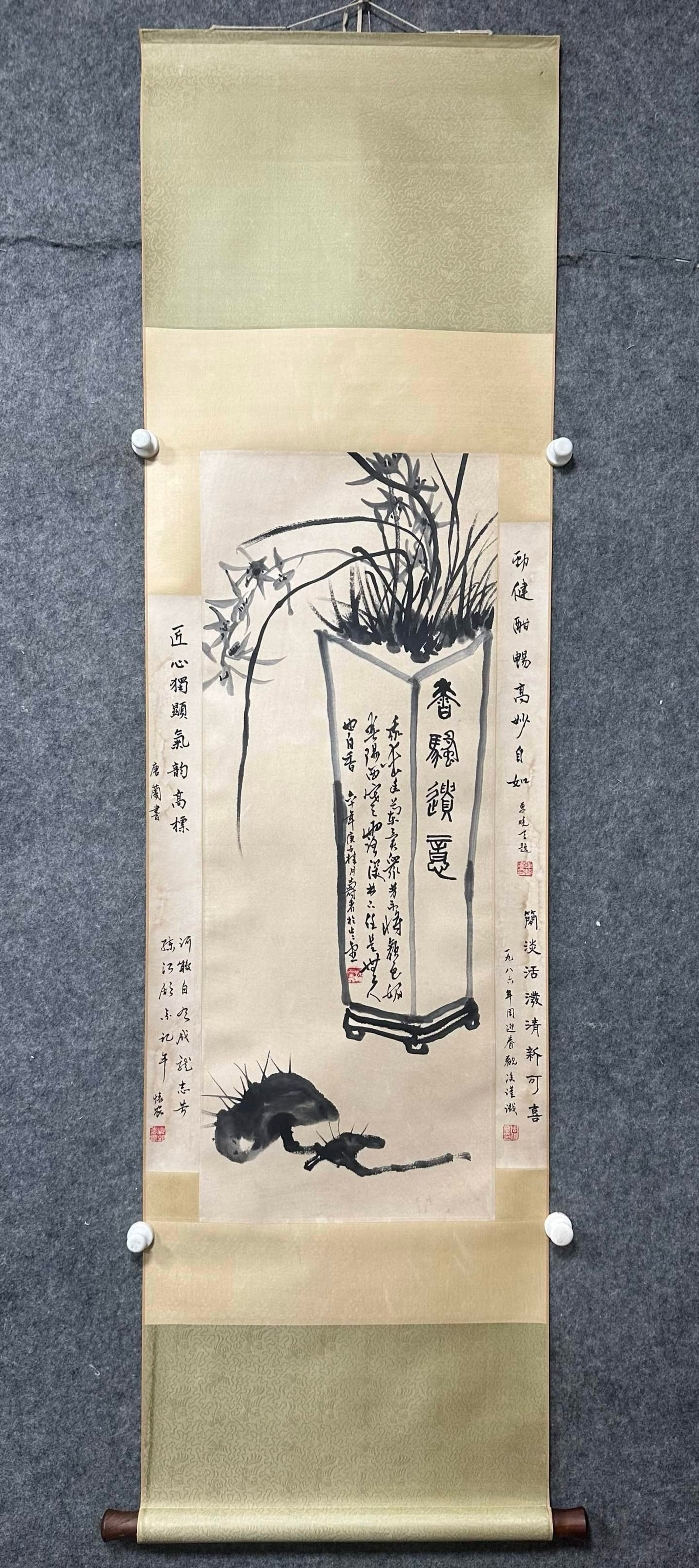 A Chinese Vertical Scroll Ink Painting of Orchid on Paper,Pan Tianshou: A Chinese Vertical Scroll Ink Painting of Orchid on Paper,Pan Tianshou,Size:(Without frame)15inx39in一幅中国水墨兰花图立轴,潘