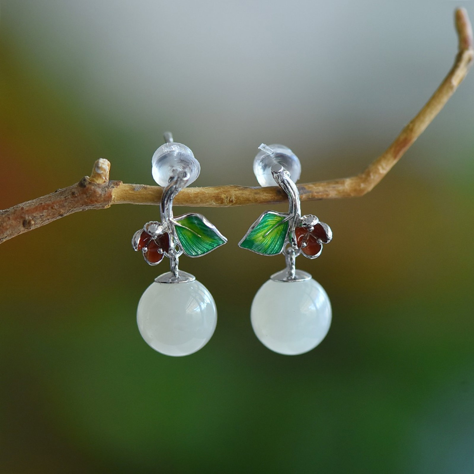 A Pair of Exquisite Sterling Silver Inlaid White Jade Earrings: A Pair of Exquisite Sterling Silver Inlaid White Jade Earrings,Size:10mmx10mm 一对纯银镶白玉耳环