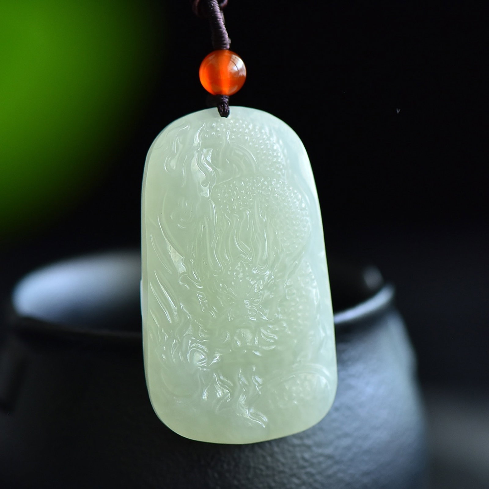 An Exquisite Greenish Jade Auspicious Cloud and Dragon Pattern Pendant: An Exquisite Greenish Jade Auspicious Cloud and Dragon Pattern Pendant,Size:46mmx27mm 青白玉祥云龙纹吊坠