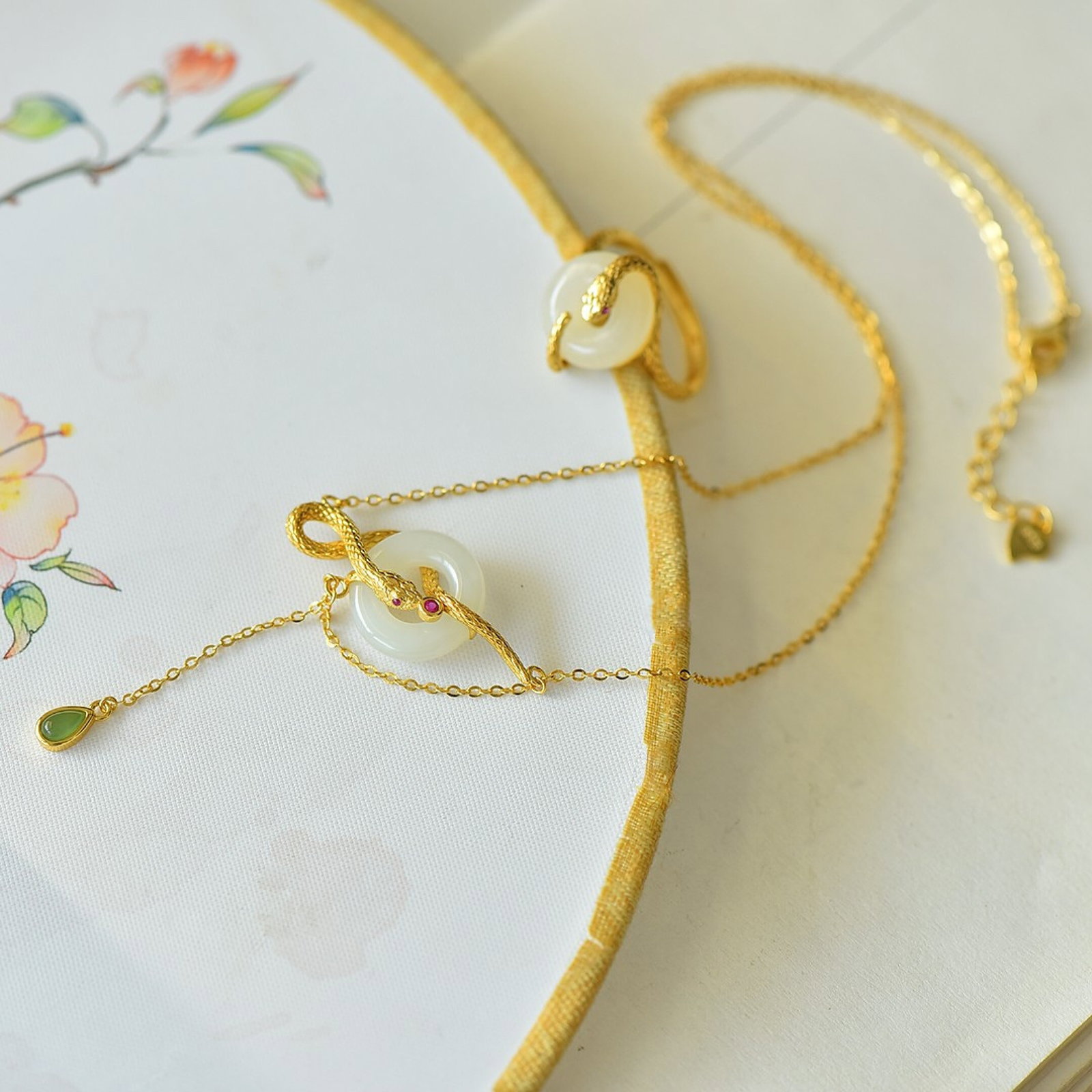 An Exquisite Sterling Silver-Gold Plated Inlaid White Jade Pendant: An Exquisite Sterling Silver-Gold Plated Inlaid White Jade Pendant 纯银镀金镶白玉吊坠