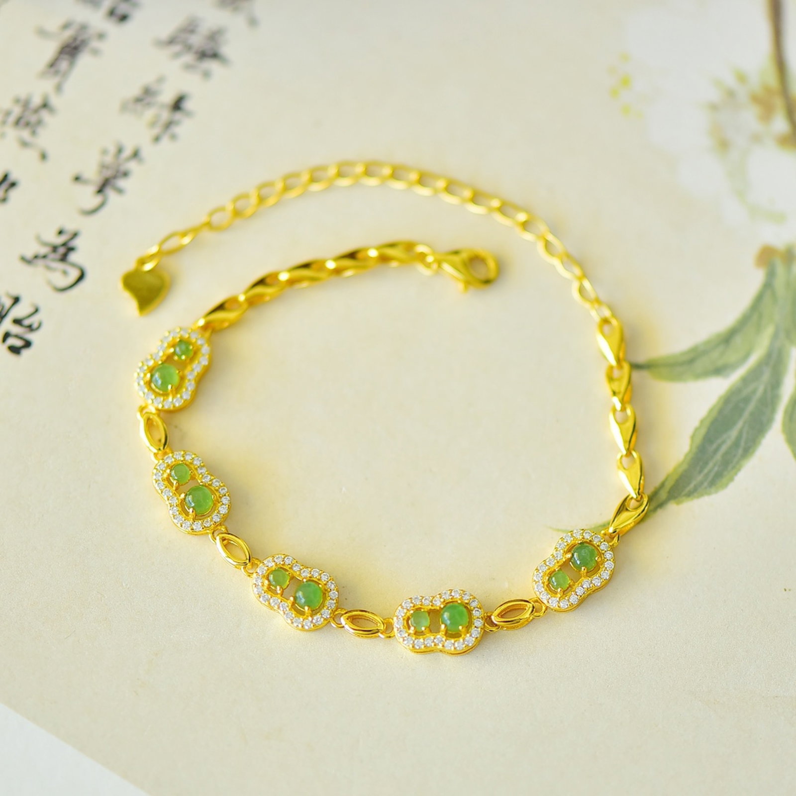 An Exquisite Sterling Silver-Gold Plated Inlaid Jasper Gourd Bracelets,Inlaid Diamond: An Exquisite Sterling Silver-Gold Plated Inlaid Jasper Gourd Bracelets,Inlaid Diamond,Size:3mmx3mm 纯银镀金镶碧玉葫芦手链,嵌&