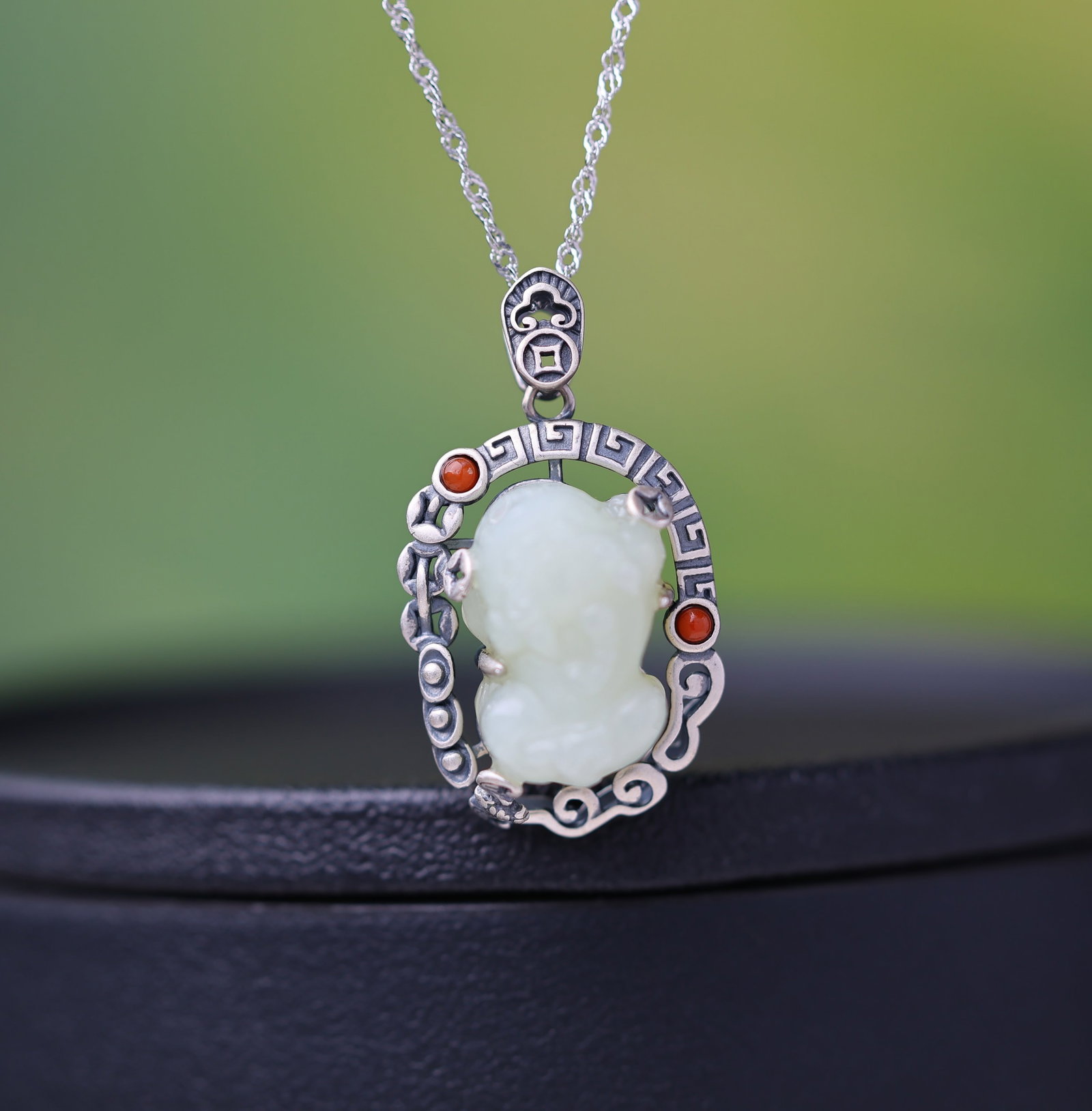 An Exquisite Sterling Silver Inlaid White Jade Pendant: An Exquisite Sterling Silver Inlaid White Jade Pendant,Size:11mmx17mm 纯银镶白玉吊坠