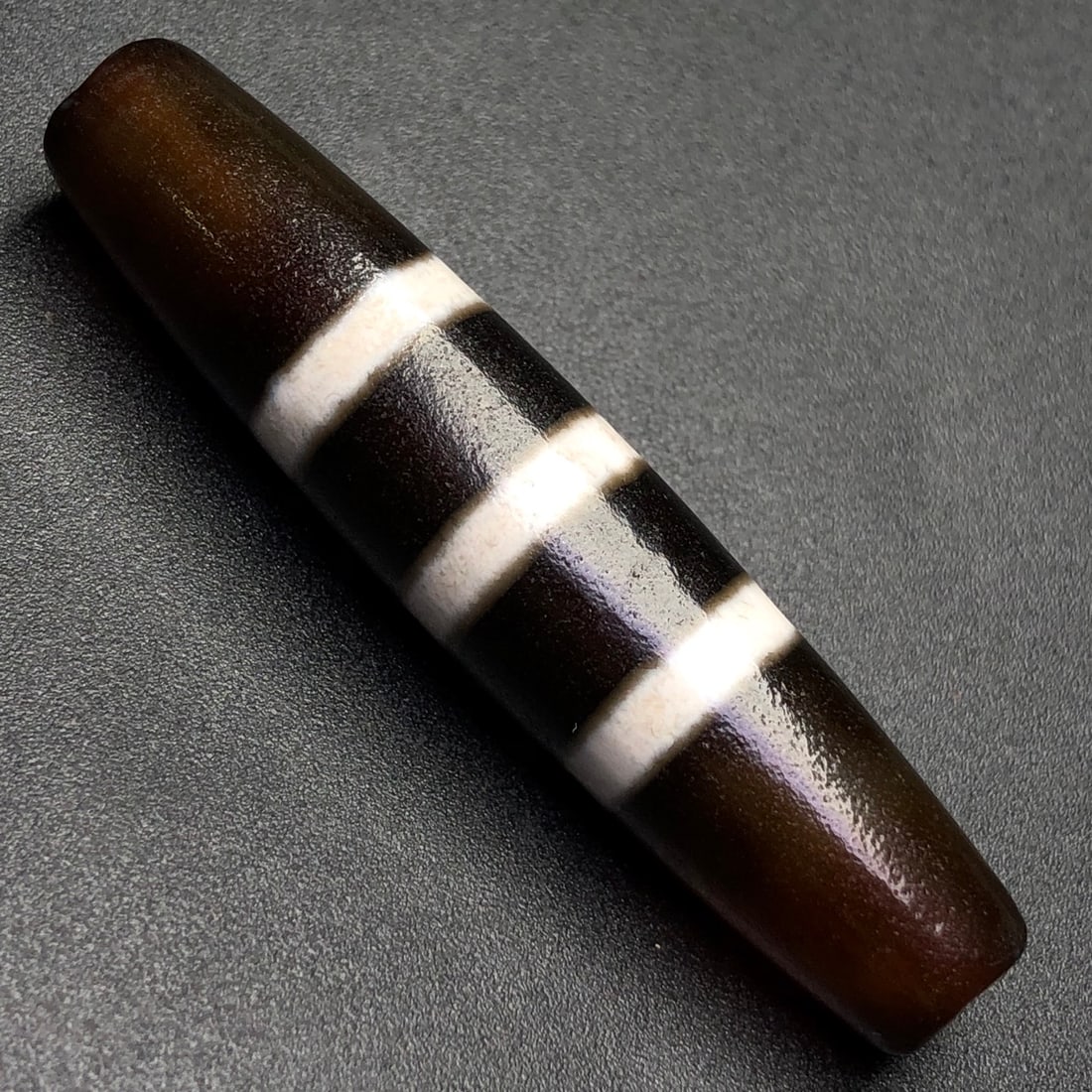 An Exquisite Dzi Bead Pendant: An Exquisite Dzi Bead Pendant,Size:58mmx12.5mm,Weight:14.3g 天珠挂件