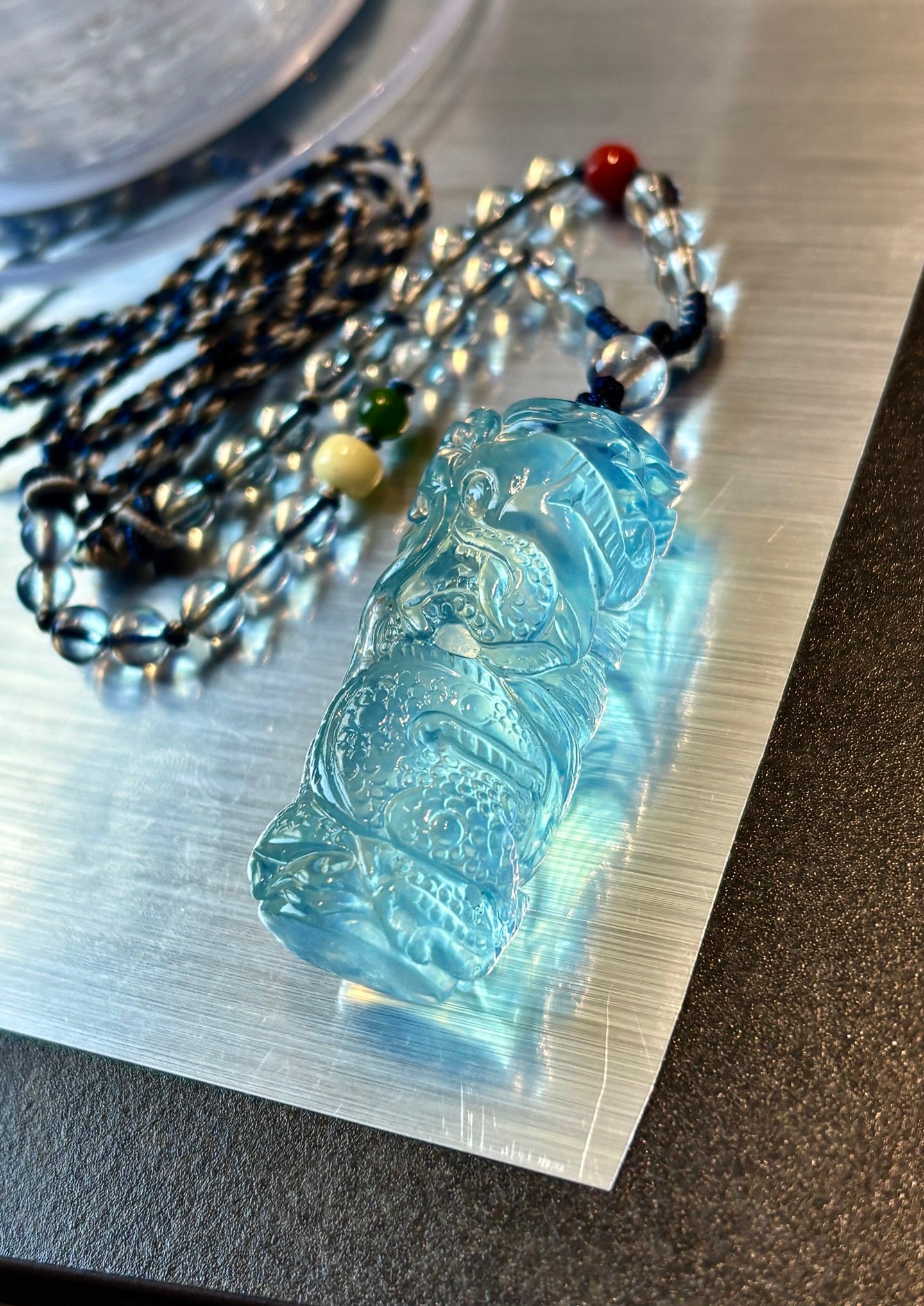 An Exquisite Aquamarine Dragon Pattern Pendant: An Exquisite Aquamarine Dragon Pattern Pendant,Size:42mmx17mm,Total Weight:22.8g 海蓝宝龙纹吊坠