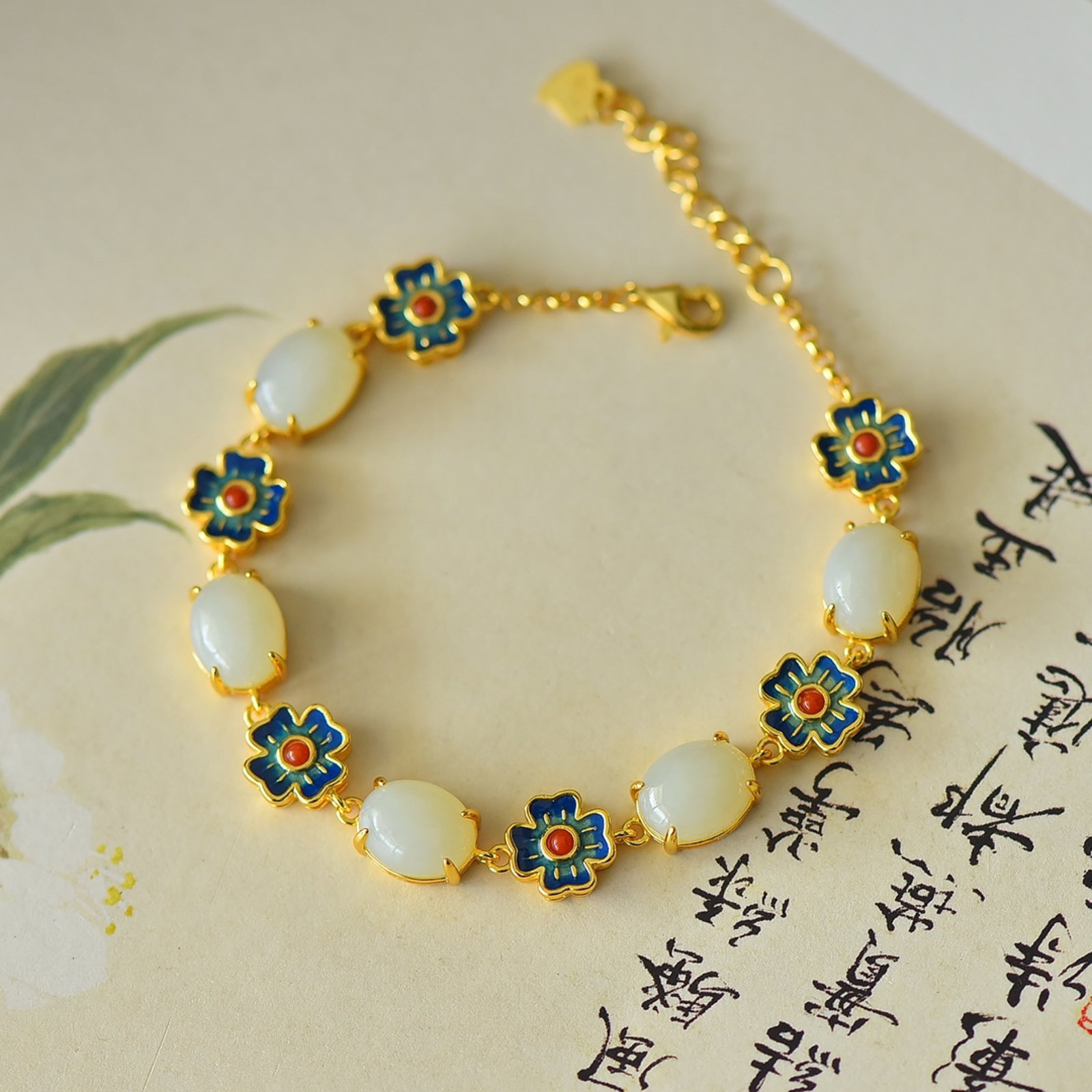 An Exquisite Sterling Silver-Gold Plated Inlaid White Jade Enamel Bracelets: An Exquisite Sterling Silver-Gold Plated Inlaid White Jade Enamel Bracelets,Size:8mmx10mm 纯银镀金镶白玉珐琅手链
