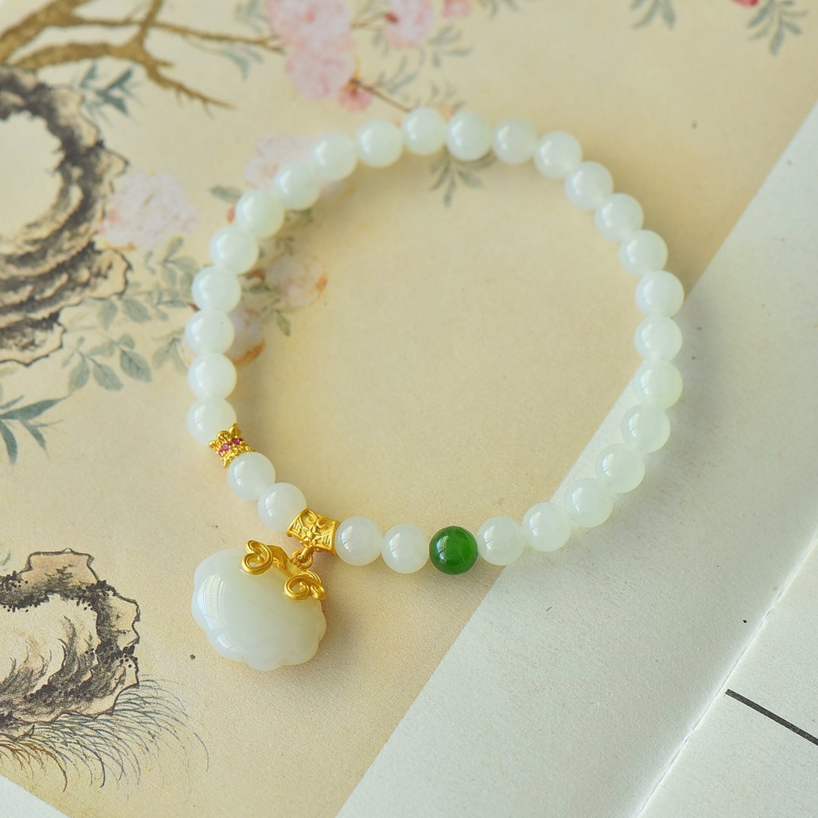 An Exquisite Sterling Silver-Gold Plated Inlaid White Jade Bracelet: An Exquisite Sterling Silver-Gold Plated Inlaid White Jade Bracelet,Size:6mm 纯银镀金镶白玉手链