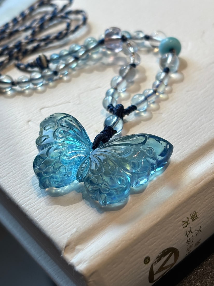 An Exquisite Aquamarine Butterfly Pendant: An Exquisite Aquamarine Butterfly Pendant,Size:36mmx23mmx9mm,Total Weight:13.9g 海蓝宝蝴蝶吊坠