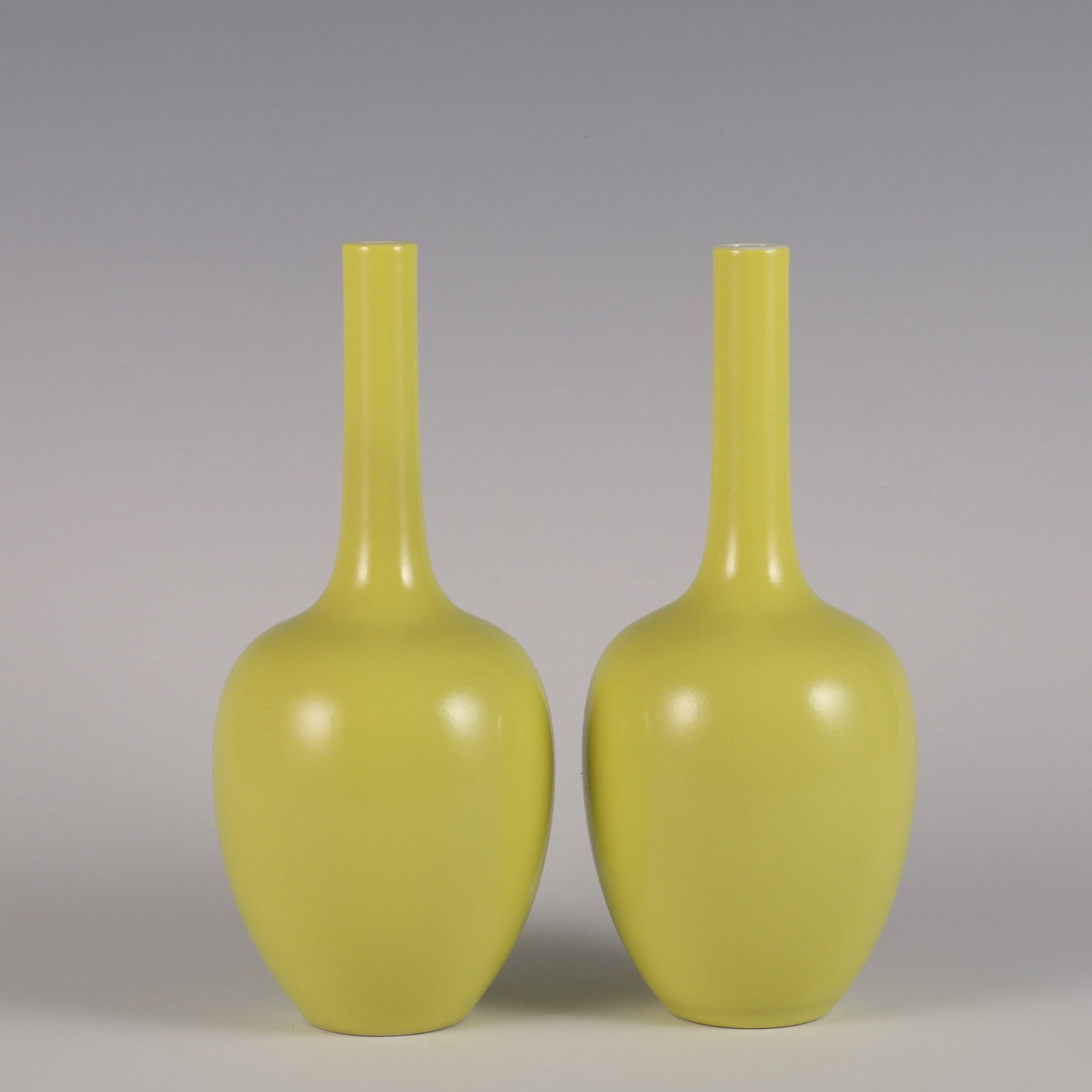 A Pair of Exquisite Yellow Glazed Vase: A Pair of Exquisite Yellow Glazed Vase Qing Dynasty, China Yongzheng Six-character Mark Size:8.3inx3.5in柠檬黄釉胆瓶一对