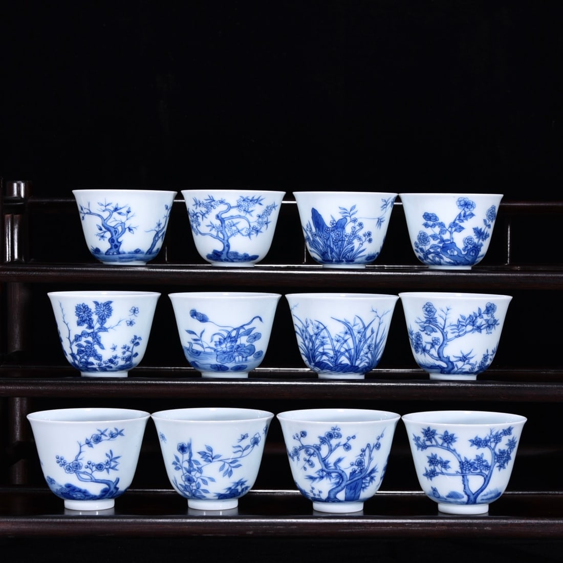 A Set of Fine Blue and White Flower Pattern with poem Cup: A Set of Fine Blue and White Flower Pattern with poem Cup Qing Dynasty, China Kangxi Six-character Mark Size:2inx2.6in青花十二花神杯 中国清&