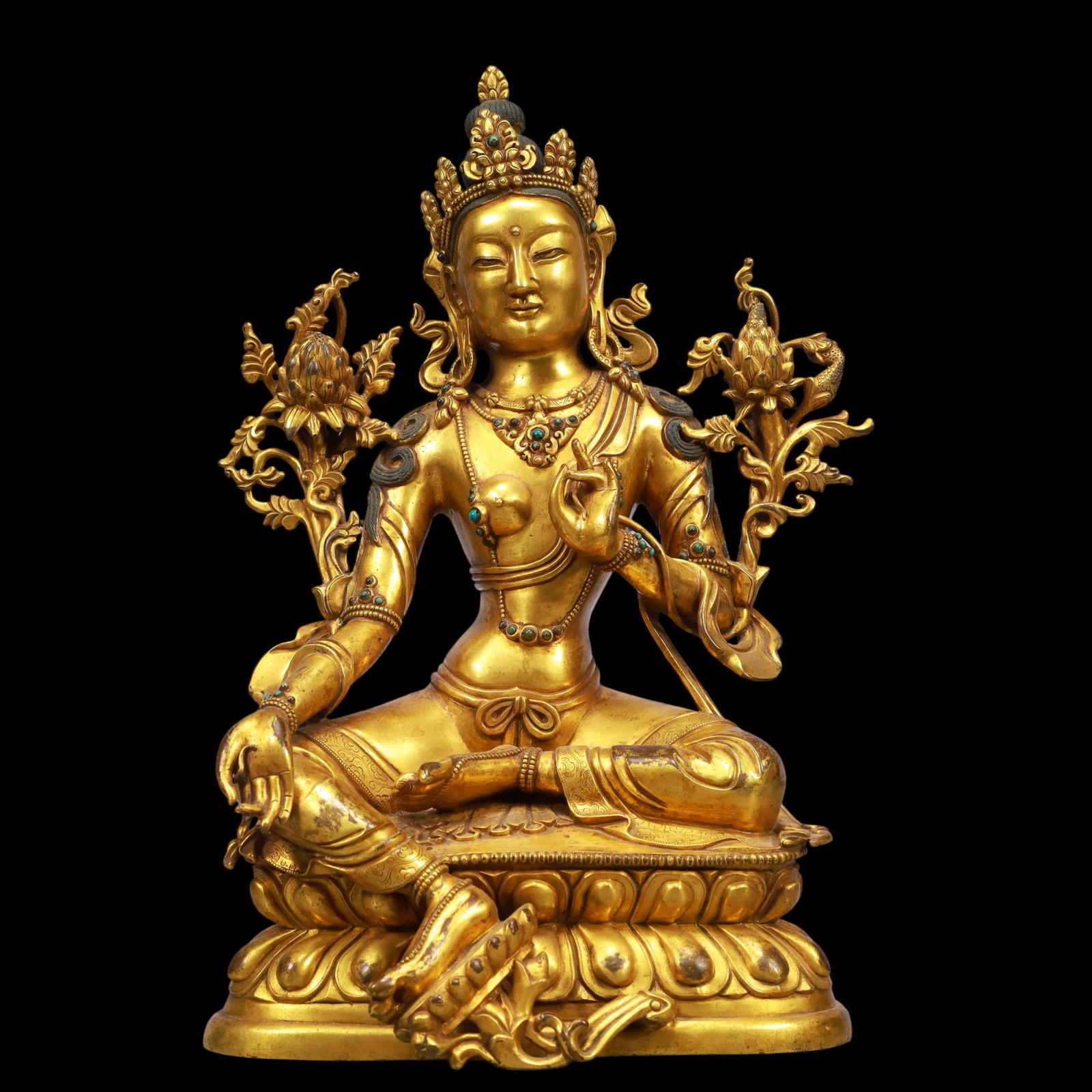 An Exquisite Gilt Bronze Inlaid Gems Statue of Avalokitesvara: An Exquisite Gilt Bronze Inlaid Gems Statue of Avalokitesvara Ming Dynasty, China Size:9.1inx5.9inx13.8in Weight:6750g铜鎏金嵌百宝观音佛像 &