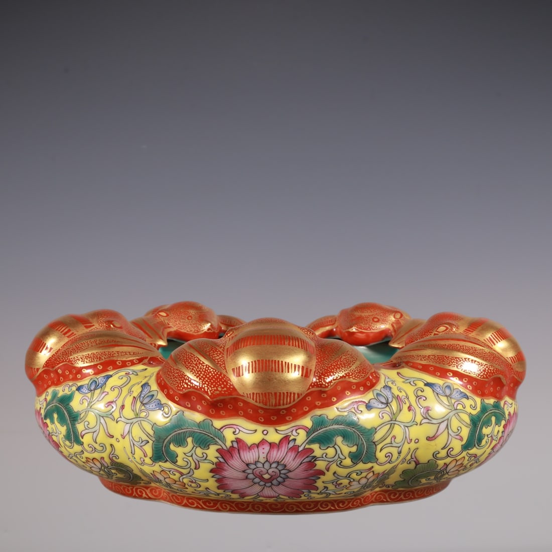An Exquisite Enamel Painted Gold Lotus Pattern Brush Washer: An Exquisite Enamel Painted Gold Lotus Pattern Brush Washer Qing Dynasty, China Qianlong Four-character Mark Size:3inx7.9in珐琅彩黄地缠枝莲描ŵ