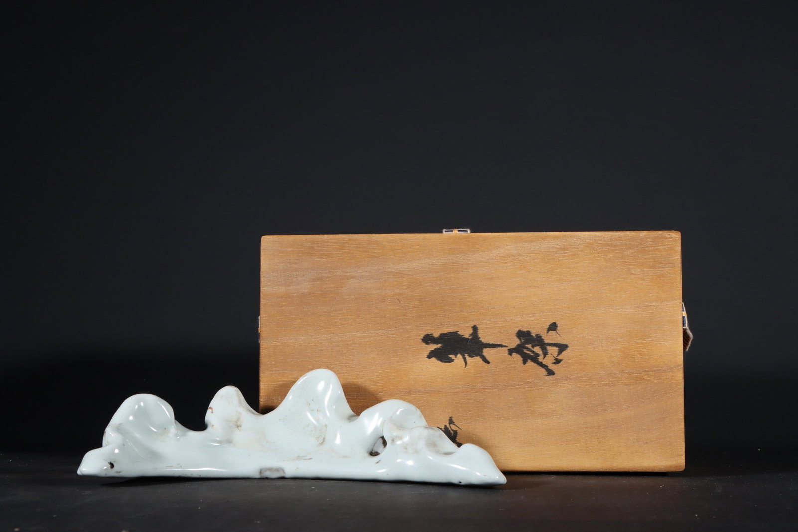 An Exquisite Guan yao Rockery Brush Holder: An Exquisite Guan yao Rockery Brush Holder Song Dynasty, China Size:2inx7.5in官窑月白釉山子笔架 中国宋代 Size:5cmx19cm