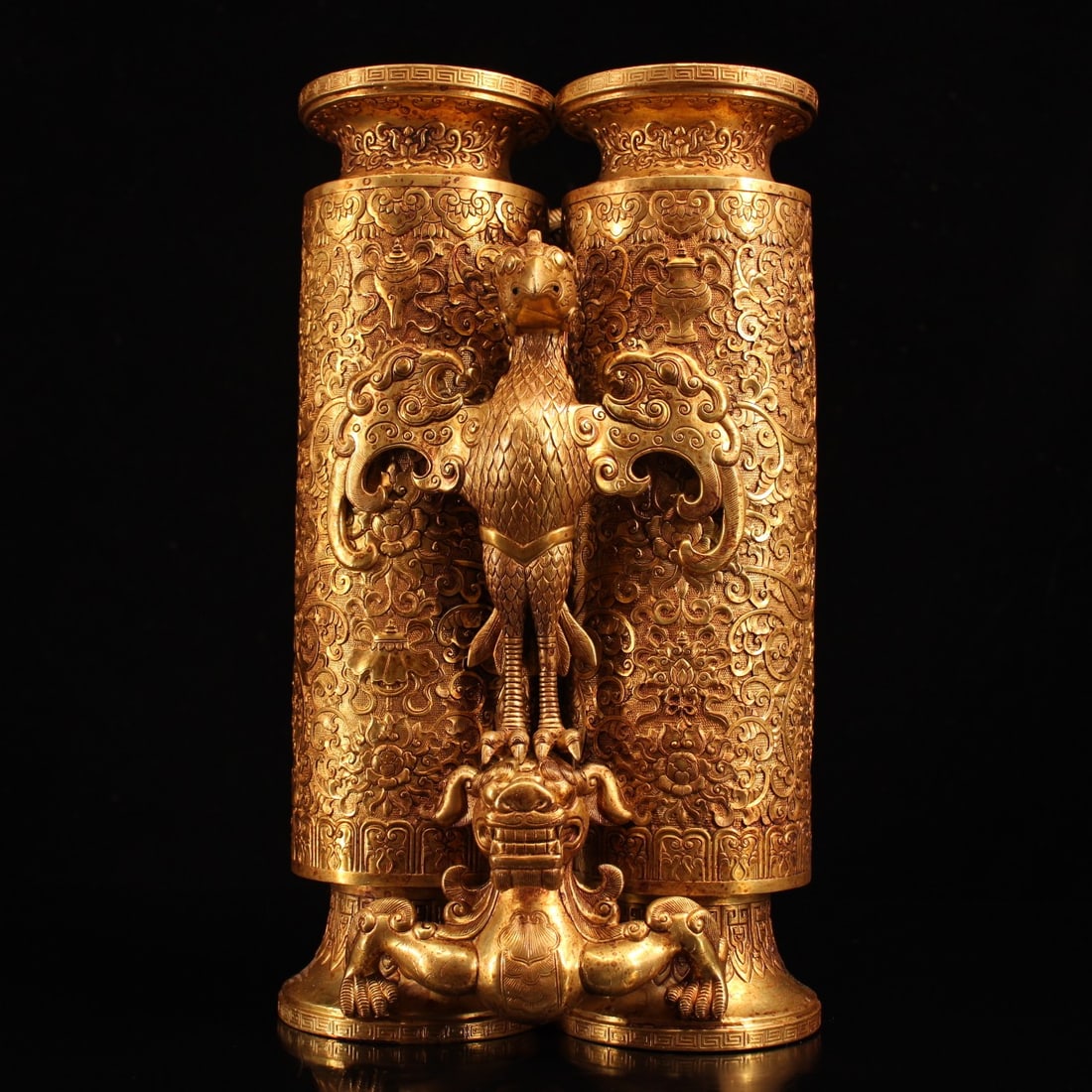 An Exquisite Gilt Bronze Eight Treasures Pattern Lotus Pattern Dragon and Phoenix Pattern Vase: An Exquisite Gilt Bronze Eight Treasures Pattern Lotus Pattern Dragon and Phoenix Pattern Vase Qing Dynasty, China Size:12.6inx7.1in Weight:5667g铜鎏金龙花瓶