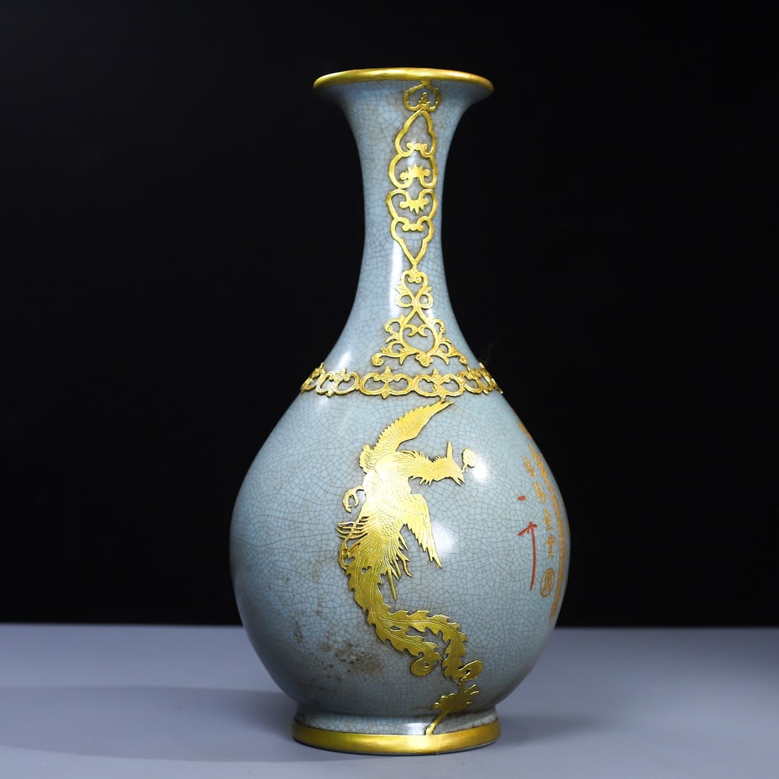 An Exquisite Ru yao Cover with Gold Dragon and Phoenix Pattern Vase: An Exquisite Ru yao Cover with Gold Dragon and Phoenix Pattern Vase Qing Dynasty, China Size:13inx7.1in Weight:1653g汝窑包金龙凤净瓶