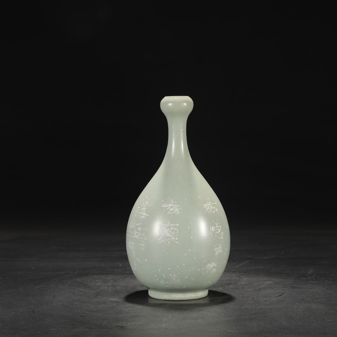 An Exquisite Ru yao Sky Blue Glazed Vase: An Exquisite Ru yao Sky Blue Glazed Vase Song Dynasty, China Size:10.6inx5.1in汝窑天青釉大蒜头瓶 中国宋代 Size:27cmx13cm