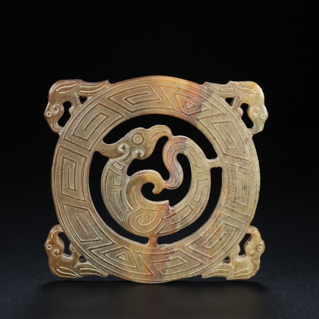 An Exquisite White Jade Phoenix Pattern Ornament: An Exquisite White Jade Phoenix Pattern Ornament S.Zhou , China Size:3.7inx3.4inx0.2in Weight:123.6g白玉凤鸟璧 商周时期 Size:9.5cmx8.6cmx0.6cm