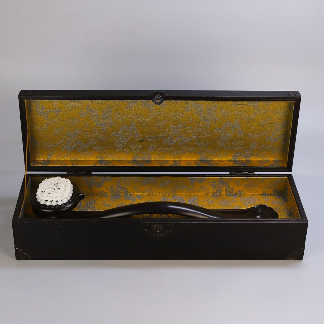 An Exquisite Zitanwood Inlaid White Jade Flower and Bird Pattern Ruyi: An Exquisite Zitanwood Inlaid White Jade Flower and Bird Pattern Ruyi Qing Dynasty, China Size:5.1inx21.3in Weight:430g Size:18.5inx4.7in