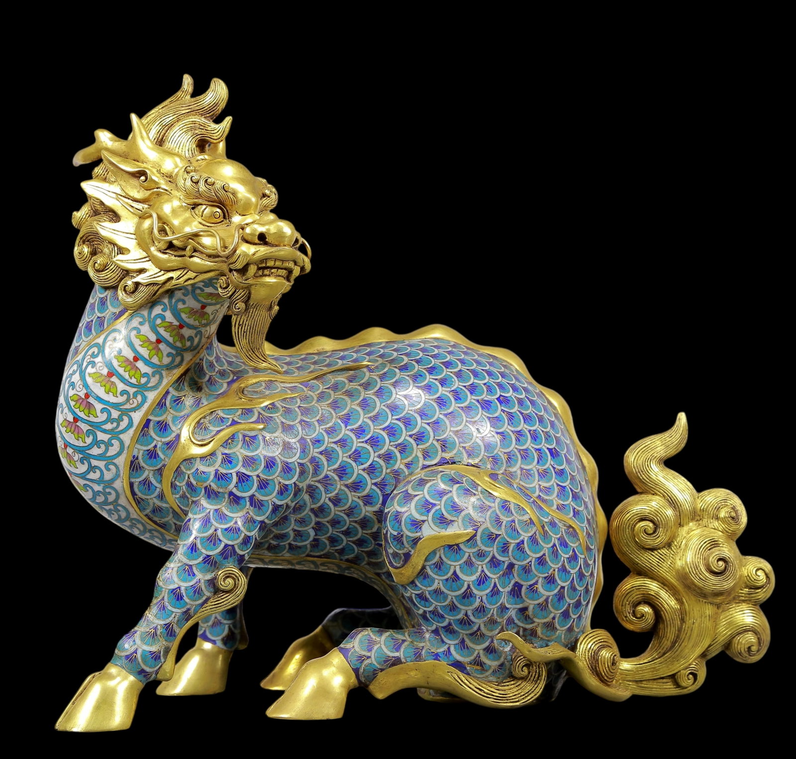 An Exquisite Gilt Bronze Cloisonne Kylin Ornament: An Exquisite Gilt Bronze Cloisonne Kylin Ornament Qing Dynasty, China Qianlong Four-character Mark Size:14.6inx6.7inx13.8in Weight:8625g清代
