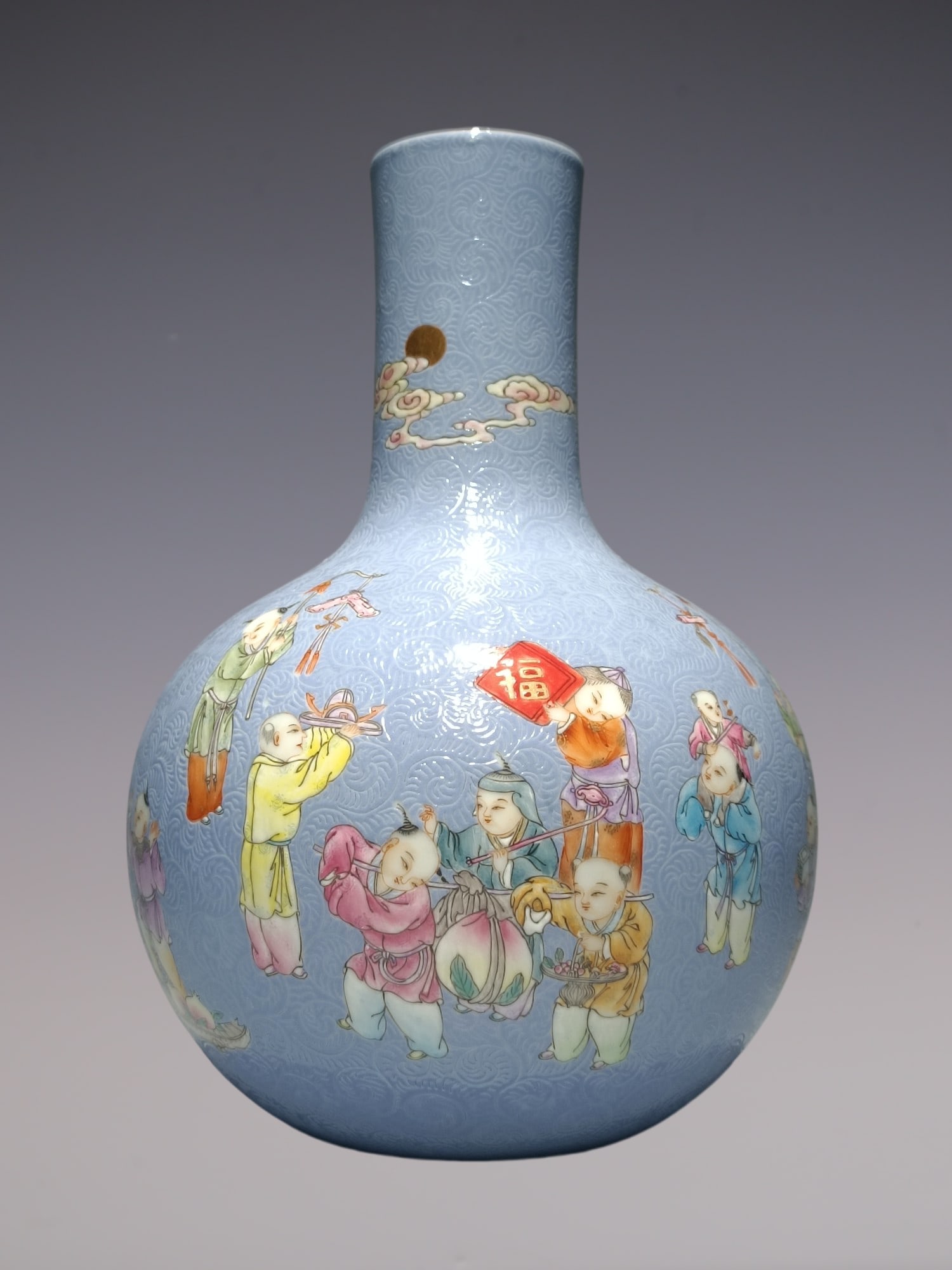 An Exquisite Famille-Rose Character and Story Pattern Vase: An Exquisite Famille-Rose Character and Story Pattern Vase Qing Dynasty, China Jiaqing Six-character Mark Size:9.1inx6.3in粉彩蓝地轧道纹婴戏ࢳ
