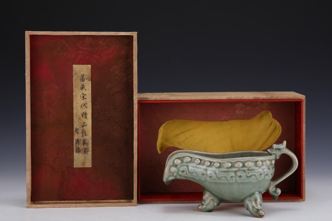 An Exquisite Longquan yao Tripod Goblet: An Exquisite Longquan yao Tripod Goblet Song Dynasty, China Size:4.5inx8.5in龙泉窑三足爵杯 中国宋代 Size:11.5cmx21.5cm