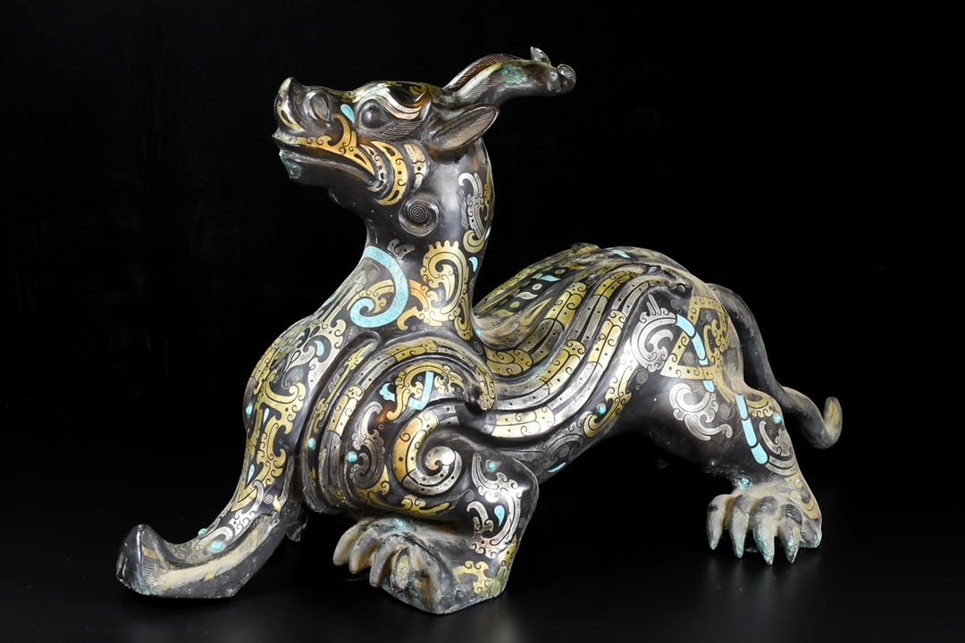 An Exquisite Bronze Inlaid Gold and Silver Auspicious Beast Ornament (1 of 9)