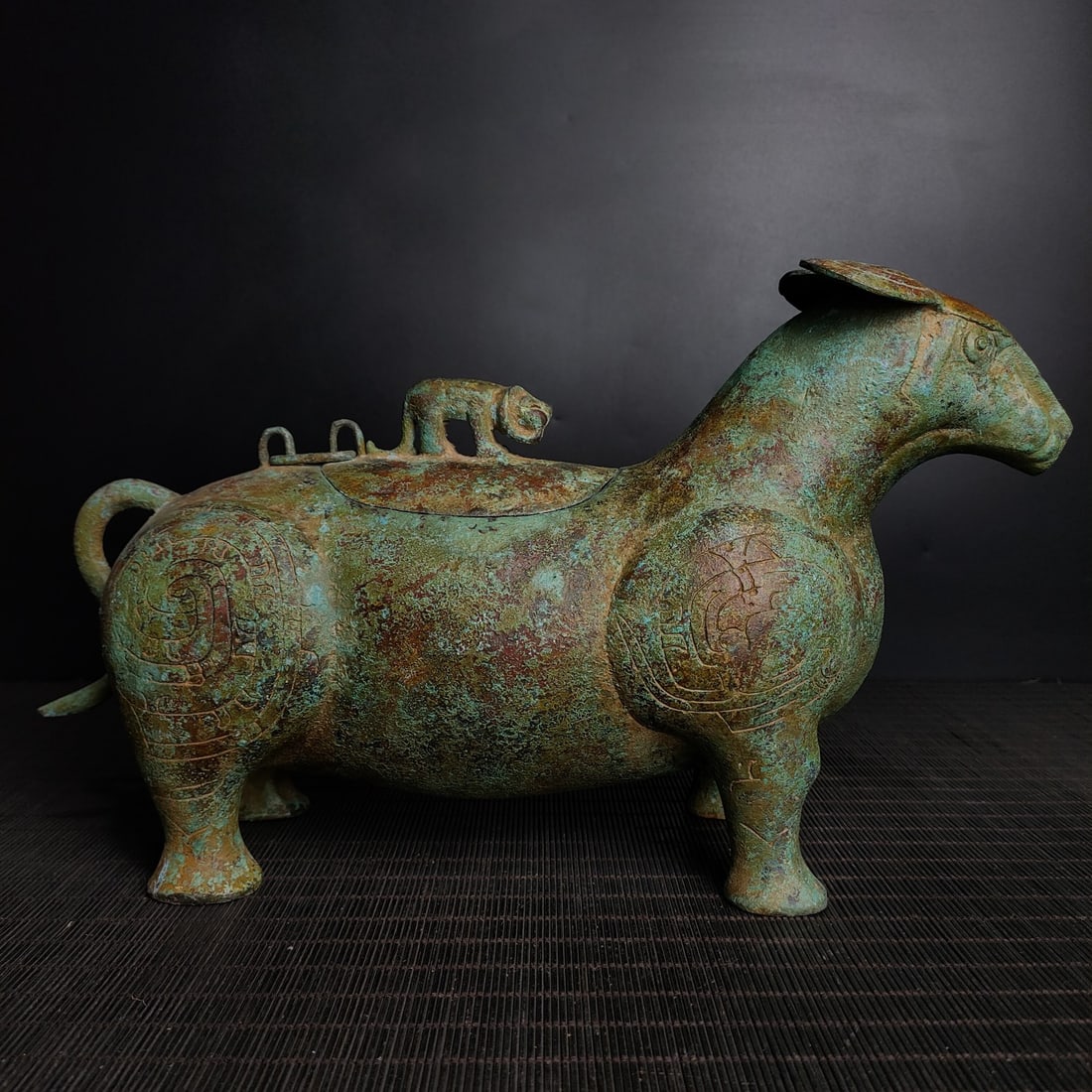 An Exquisite Bronze With Inscription Rhinoceros-Shaped Censer: An Exquisite Bronze With Inscription Rhinoceros-Shaped Censer the Warring States period in China Size:7.9inx13.4in Weight:2.9kg青铜犀尊 战国时期 Size:20