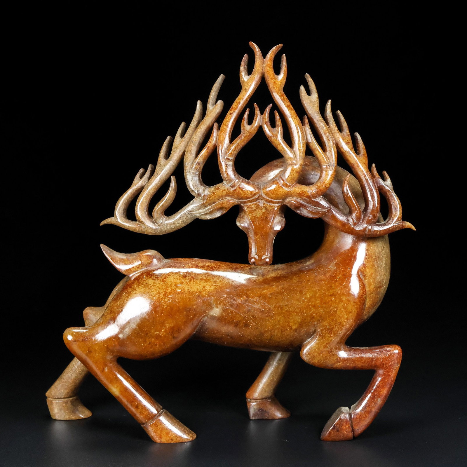 An Exquisite White Jade Deer Ornament: An Exquisite White Jade Deer Ornament Qing Dynasty, China Size:7.1inx6.7inx2.2in Weight:671g白玉一鹿发财摆件 中国清代 Size:18cmx