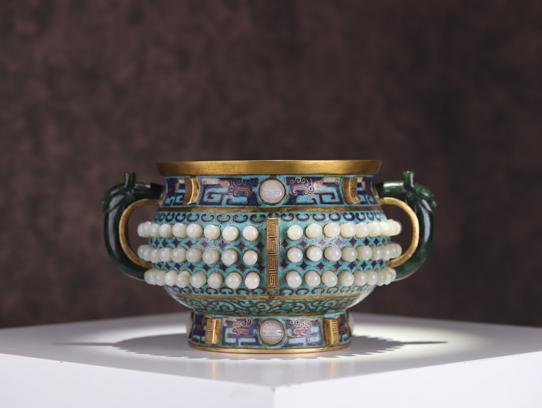 An Exquisite Cloisonne Inlaid White Jade Double-Ears Censer: An Exquisite Cloisonne Inlaid White Jade Double-Ears Censer Qing Dynasty, China Qianlong Four-character Mark Size:9.5inx7.5inx5.2in Weight:1905g景泰蓝镶白玉双