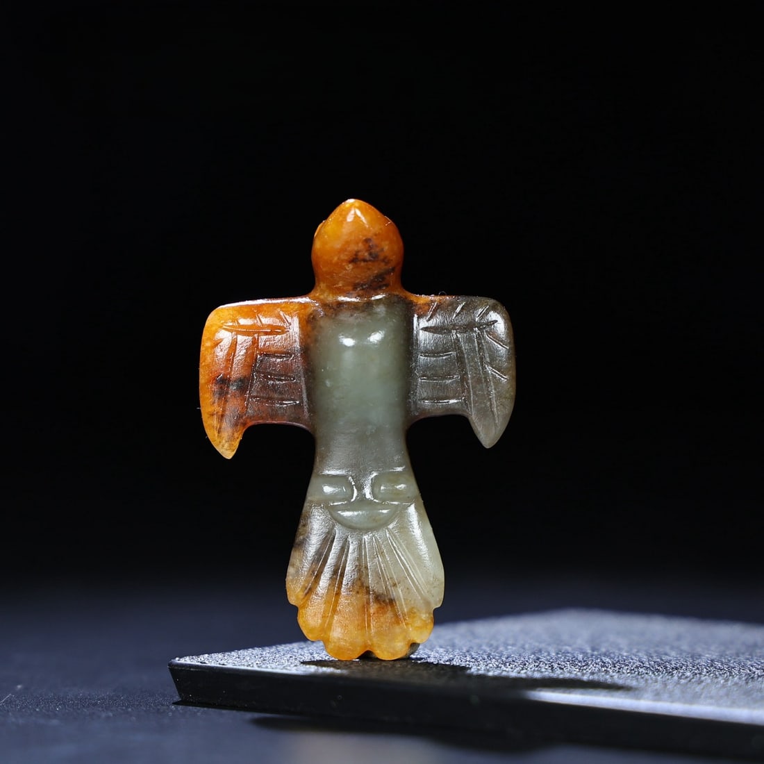 An Exquisite White Jade Eagle Pendant: An Exquisite White Jade Eagle Pendant Han Dynasty, China Size:2.6inx1.8inx0.6in Weight:33g白玉鹰挂饰 中国汉代 Size:6.6cmx4.5cmx1.5cm Weight:33g