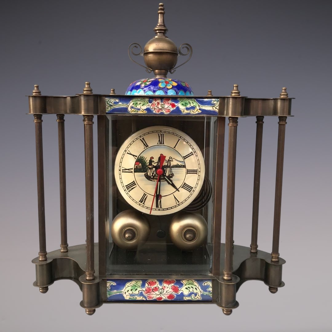 An Exquisite Bronze Lotus Pattern Clock: An Exquisite Bronze Lotus Pattern Clock Qing Dynasty, China Size:9.1inx3.9inx11in铜缠枝莲纹钟表 中国清代 Size:23cmx10cmx28cm