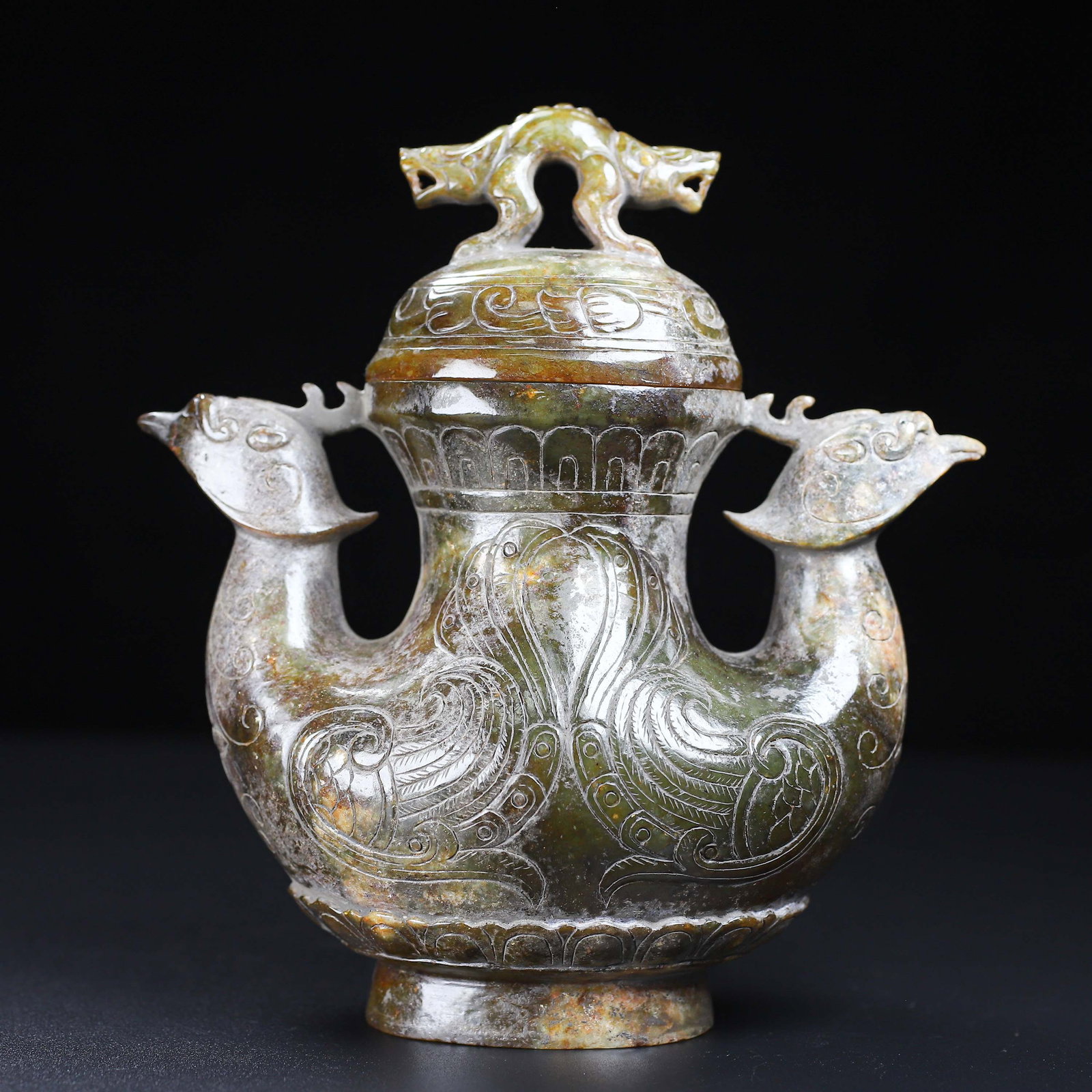 An Exquisite White Jade Phoenix Pattern Vase: An Exquisite White Jade Phoenix Pattern Vase Han Dynasty, China Size:6.1inx6.6inx2.3in Weight:1.015kg白玉双凤鸟瓶 中国汉代