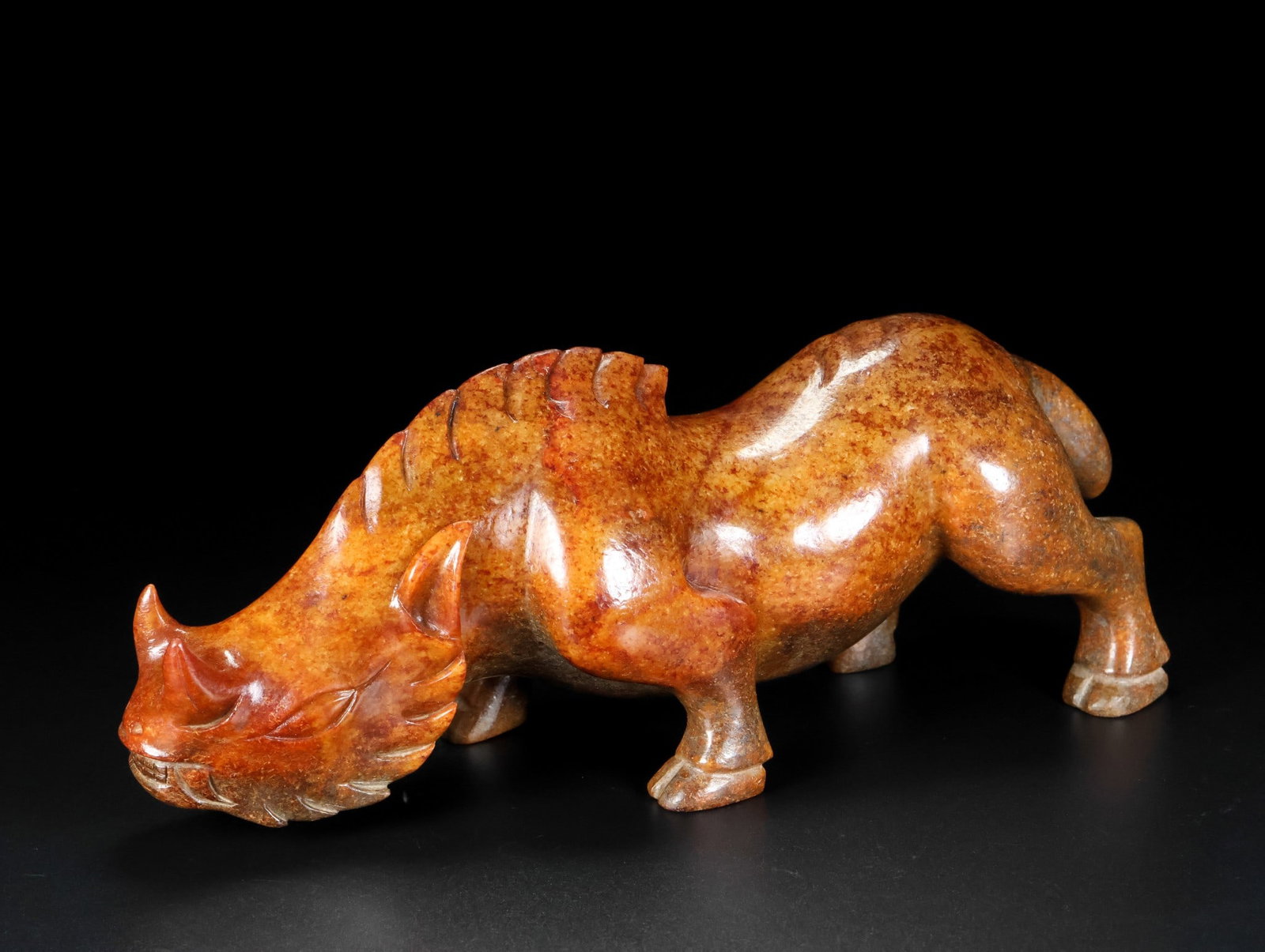 An Exquisite White Jade Auspicious Beast Ornament: An Exquisite White Jade Auspicious Beast Ornament Qing Dynasty, China Size:9.4inx3.9inx3.1in Weight:1327g白玉瑞兽摆件 中国清代
