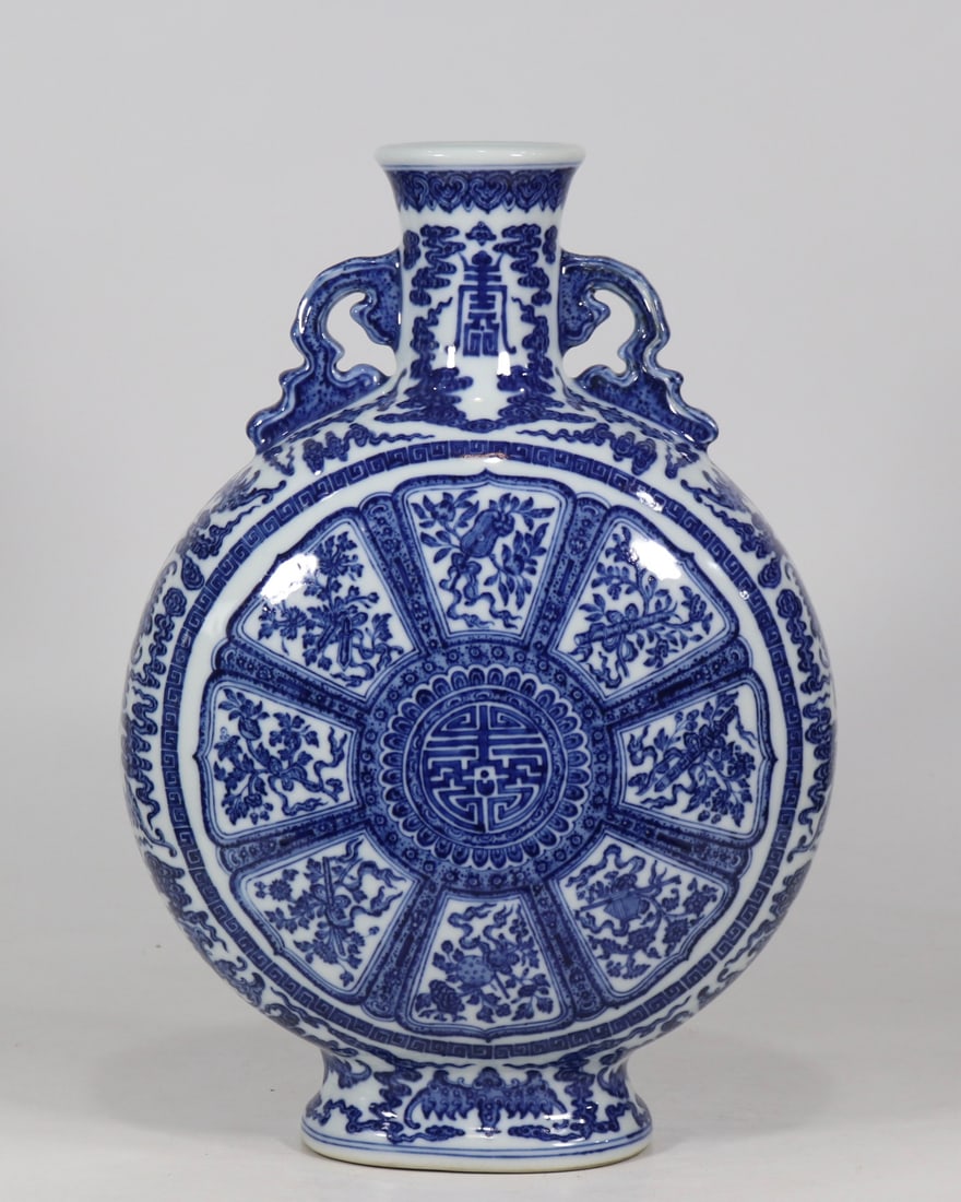 An Exquisite Blue and White Eight Treasures Pattern Bats and Peach Pattern Double-Ears Vase: An Exquisite Blue and White Eight Treasures Pattern Bats and Peach Pattern Double-Ears Vase Qing Dynasty, China Qianlong Six-character Mark Size:15.7inx10.6in青花寿字八&#