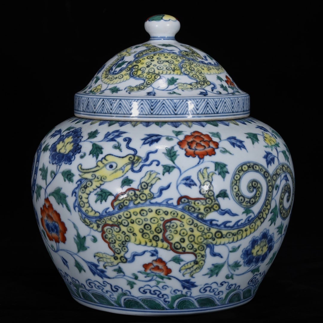 An Exquisite Doucai Dragon Pattern Lotus Pattern Seawater Pattern Jar: An Exquisite Doucai Dragon Pattern Lotus Pattern Seawater Pattern Jar Ming Dynasty, China Chenghua Six-character Mark Size:9.8inx9.1in斗彩龙纹盖罐 中国&