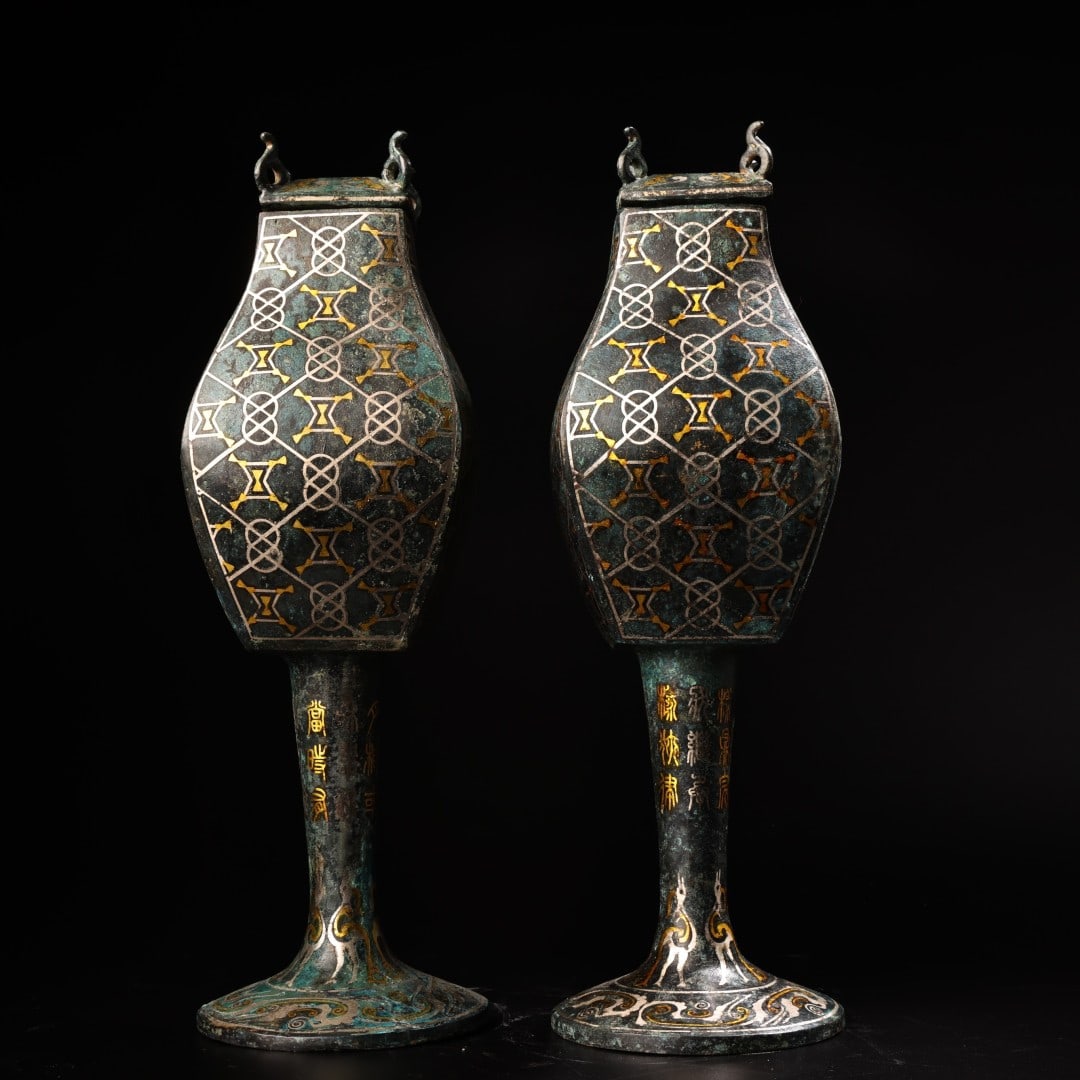 A Pair of Exquisite Bronze Inlaid Gold and Silver With Inscription Censer: A Pair of Exquisite Bronze Inlaid Gold and Silver With Inscription Censer Han Dynasty, China Size:13inx4.3in Weight:1300g青铜错金银器高腿方尊