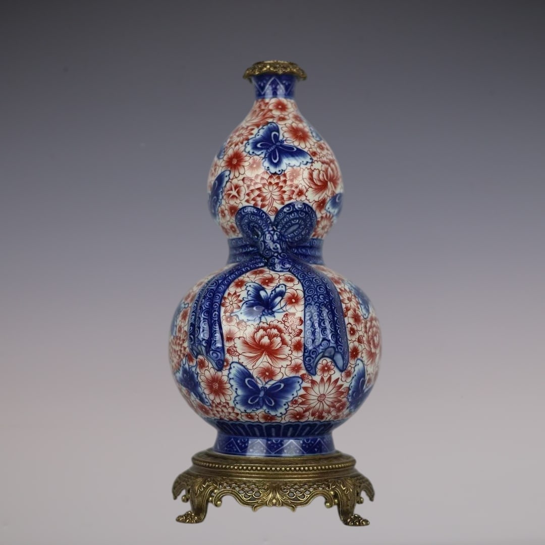 An Exquisite Blue and White Underglaze-Red Inlaid Bronze Flower and Butterfly Pattern Gourd-Shaped (1 of 9)