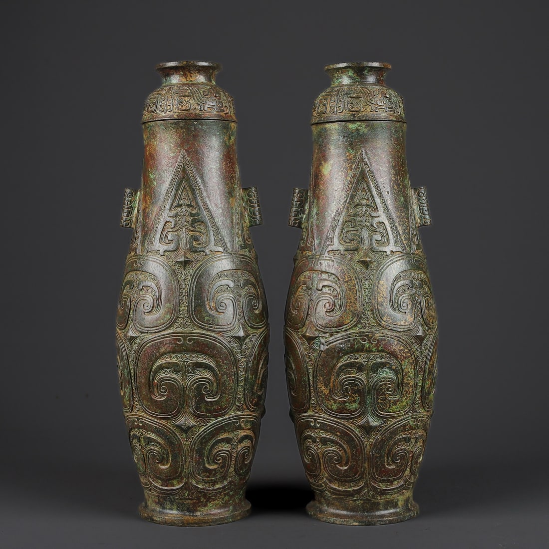 A Pair of Exquisite Bronze With Inscription Vase: A Pair of Exquisite Bronze With Inscription Vase W.Zhou , China Size:4.3inx12.6in Weight:4150g青铜高圆瓶一对 西周时期 Size:11cmx32cm W