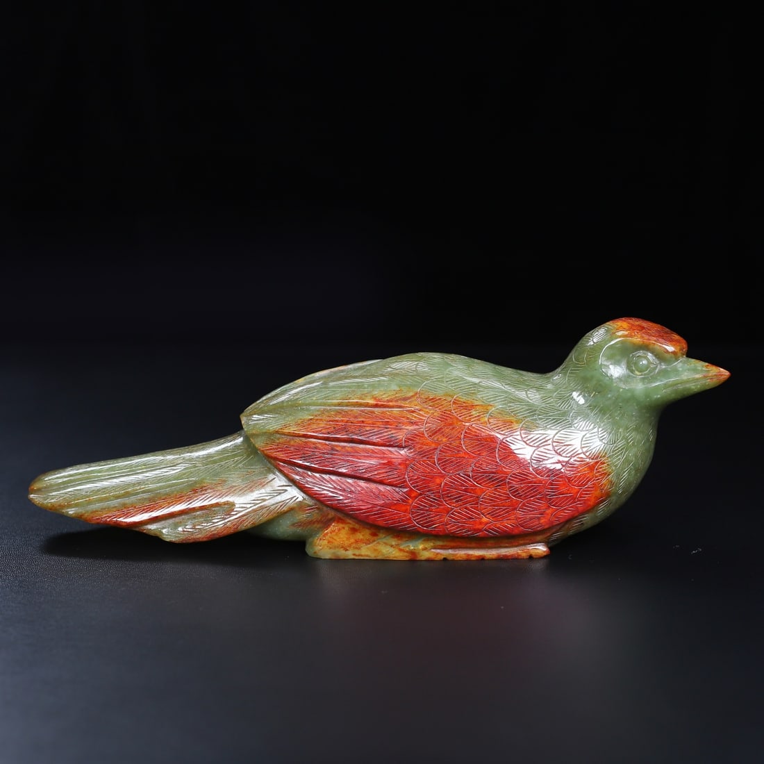 An Exquisite White Jade Bird Ornament: An Exquisite White Jade Bird Ornament Han Dynasty, China Size:9.3inx3.2inx3in Weight:1.286kg白玉鸟 中国汉代 Size:23.6cmx8.2cmx7.6cm Weight:1.286kg