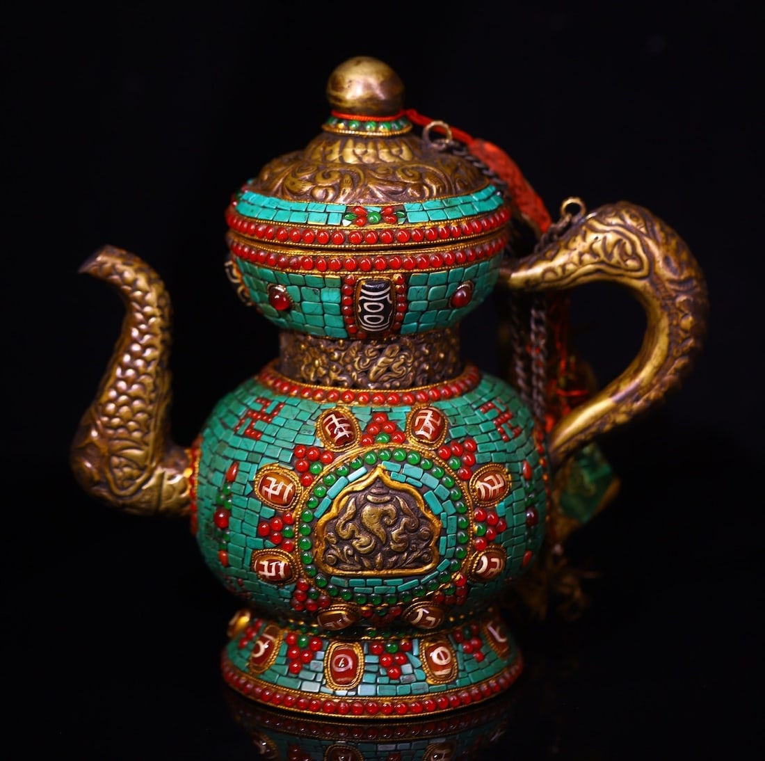 An Exquisite Bronze Inlaid Gems Dzi Bead Ewer: An Exquisite Bronze Inlaid Gems Dzi Bead Ewer Qing Dynasty, China Size:9.1inx9.1in Weight:1260g铜嵌宝石天珠酥油壶 中国清代