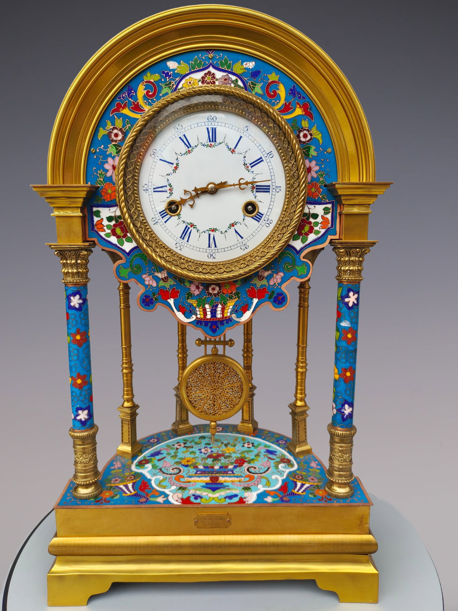 An Exquisite Gilt Bronze Lotus Pattern Clock: An Exquisite Gilt Bronze Lotus Pattern Clock Qing Dynasty, China Size:12.2inx7.9inx20.9in铜鎏金缠枝莲纹钟表 中国清代 Size: