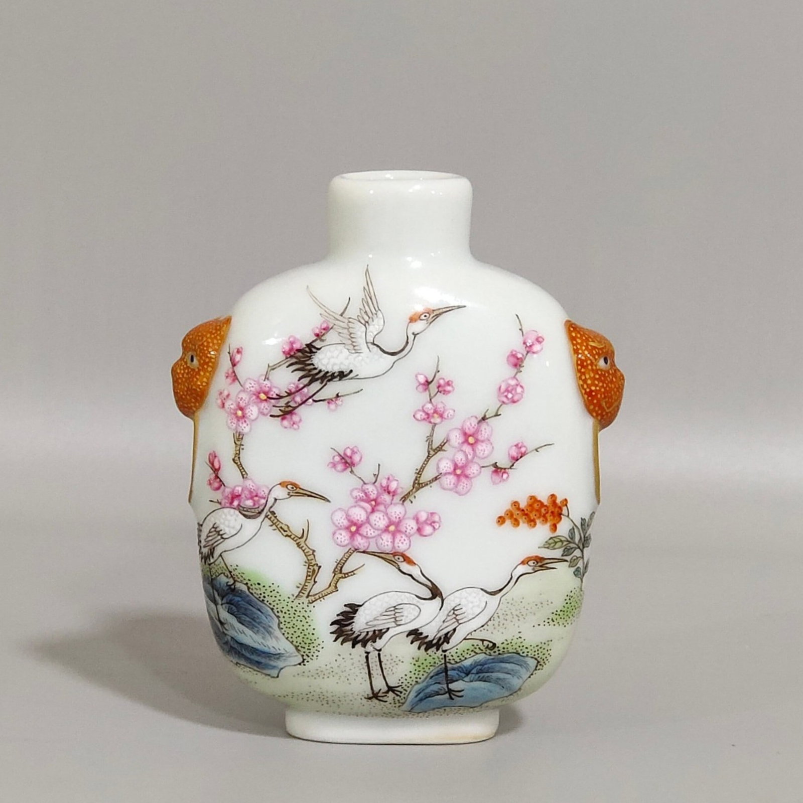 An Exquisite Famille-Rose Pine and Crane Pattern Snuff Bottle: An Exquisite Famille-Rose Pine and Crane Pattern Snuff Bottle,Qing Dynasty,China,Qianlong Four-character Mark,Size:2.8inx2in