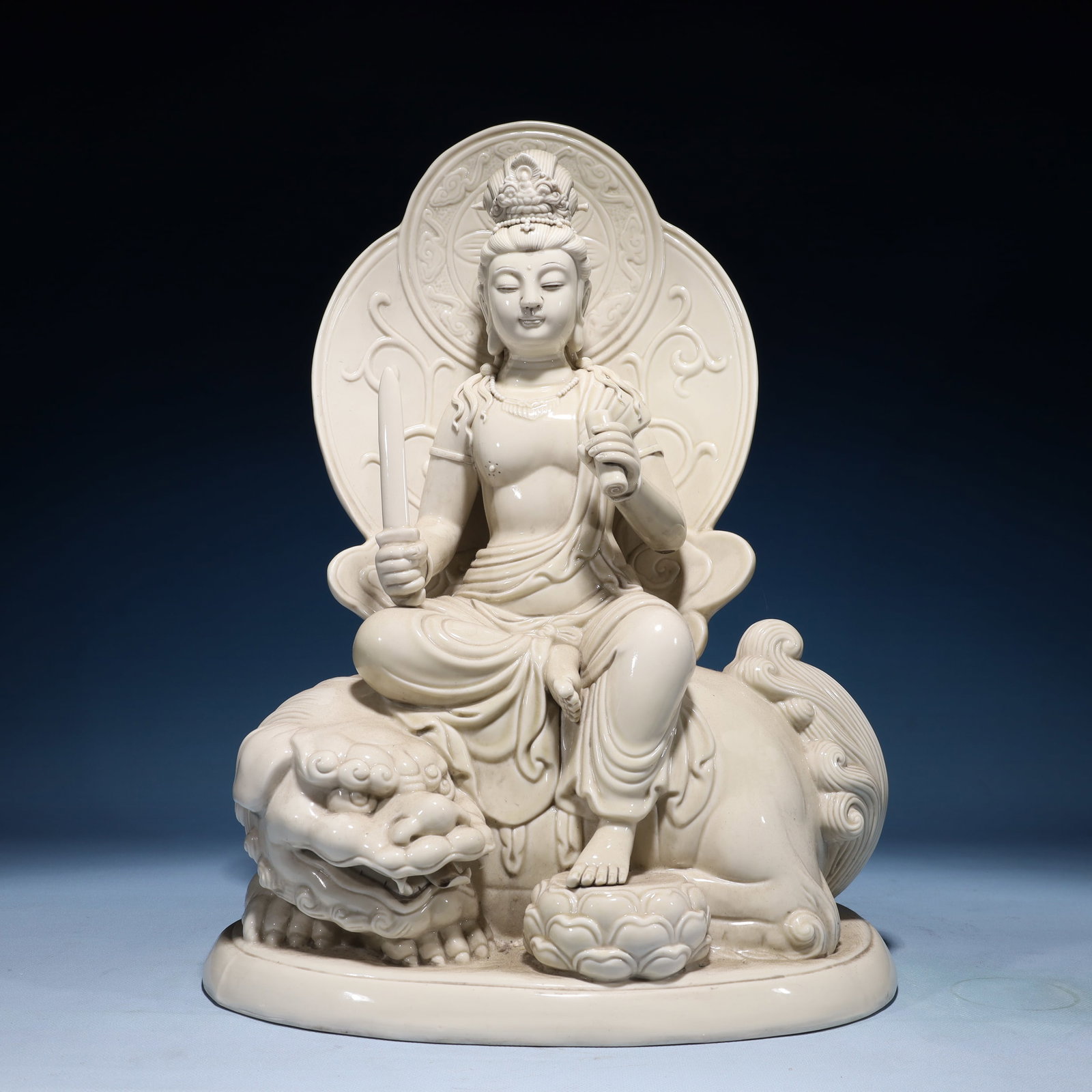 A Solemn Blance-De-Chine Statue of Manjusri: A Solemn Blance-De-Chine Statue of Manjusri Blance-De-Chine Statue of Manjusri,Ming Dynasty,China,He Chaozong Mark,Size:12.6inx9.8inx17.7in,Weight:5400g