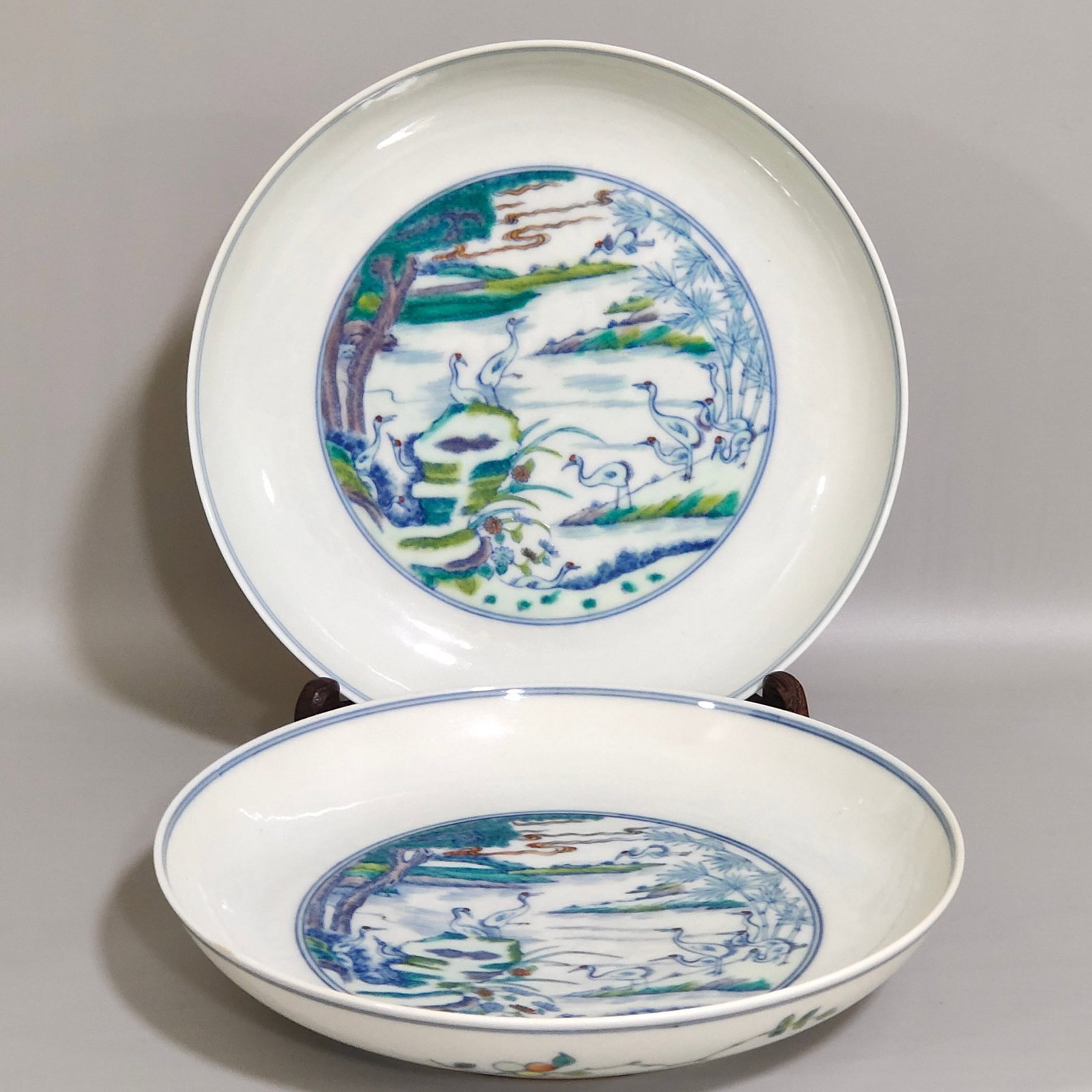A Pair of Exquisite Doucai Pine and Crane Pattern Plates: A Pair of Exquisite Doucai Pine and Crane Pattern Plates,Qing Dynasty,China,Yongzheng Six-character Mark,Size:1.3inx7.1in
