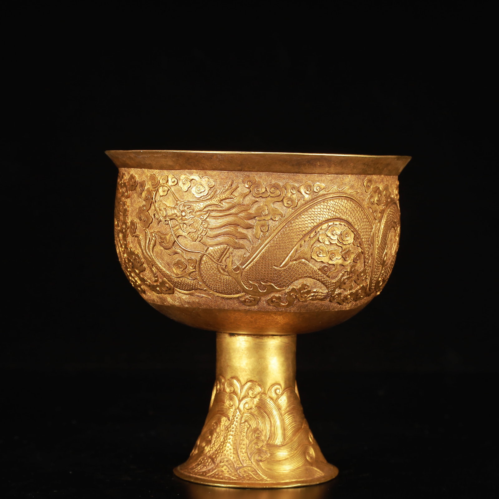 An Exquisite Gilt Bronze Auspicious Cloud and Dragon Pattern Stem Cup: An Exquisite Gilt Bronze Auspicious Cloud and Dragon Pattern Stem Cup,Qing Dynasty, China,Size:5.9inx5.9in,Weight:700g 铜鎏金祥云龙纹高足杯,