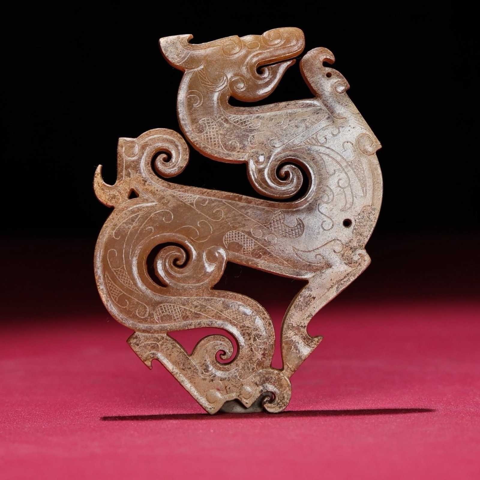 An Exquisite Archaic Jade Dragon Pendant: An Exquisite Archaic Jade Dragon Pendant,Ancient Time,China,Size:3.5inx2.6inx0.2in,Weight:53g 高古玉龙挂件,中国远古时期